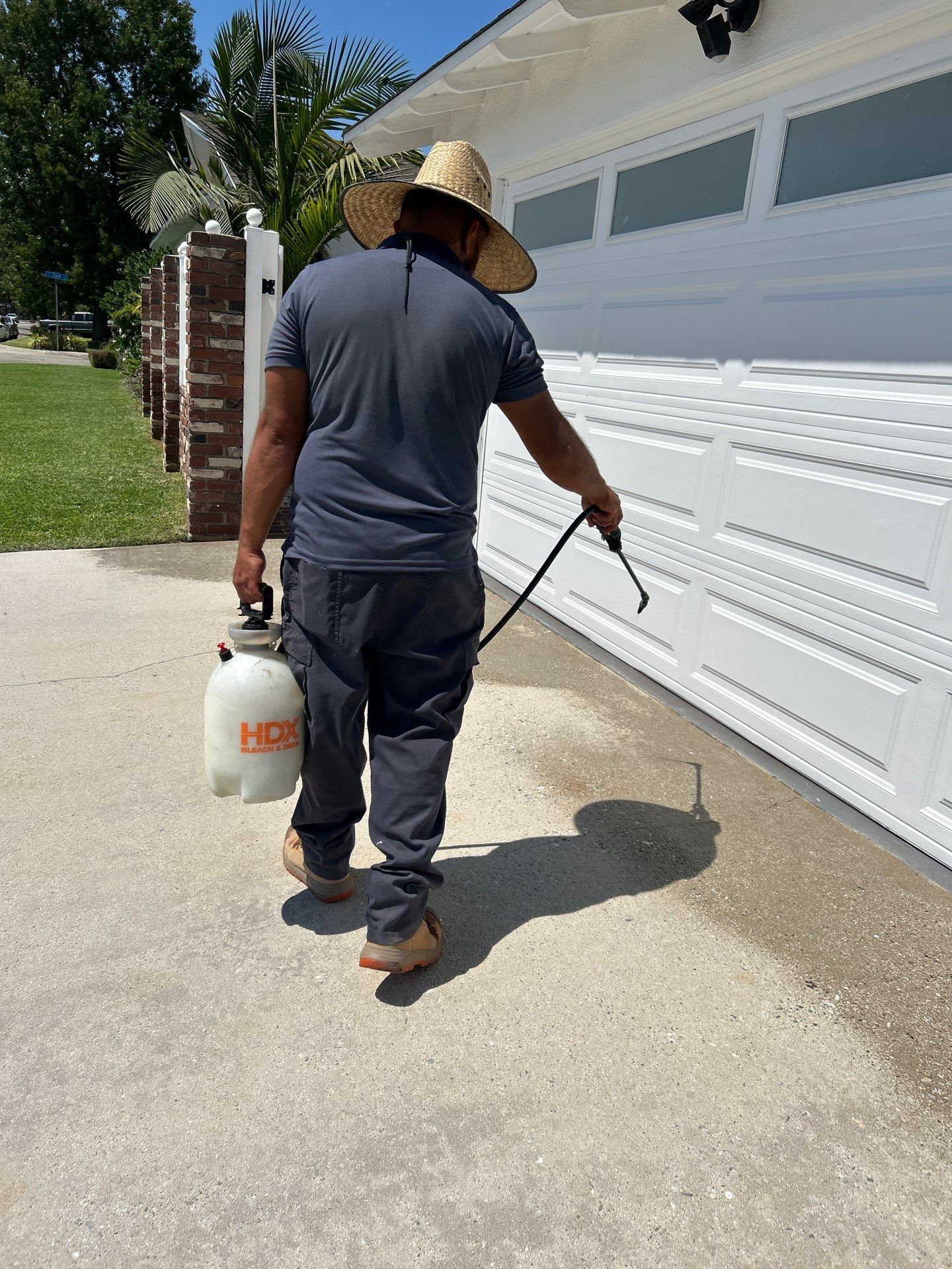 Sandblasting Paint Off Concrete Driveway In Downey, CA by La Power Washing Inc