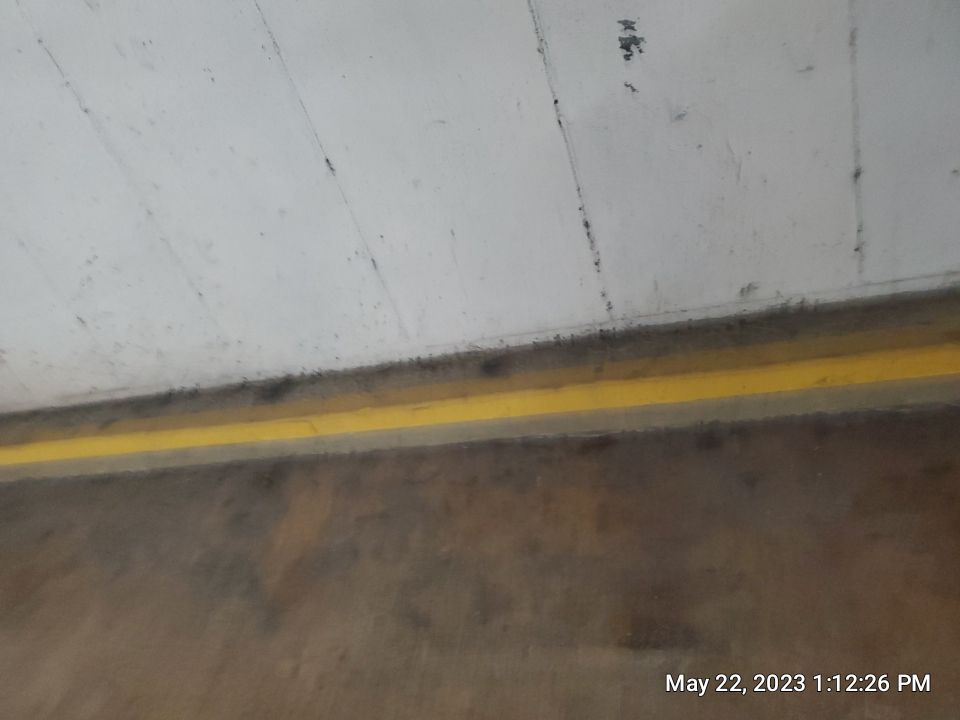 Parking garage using Hot water by Northern Power Washing LLC.