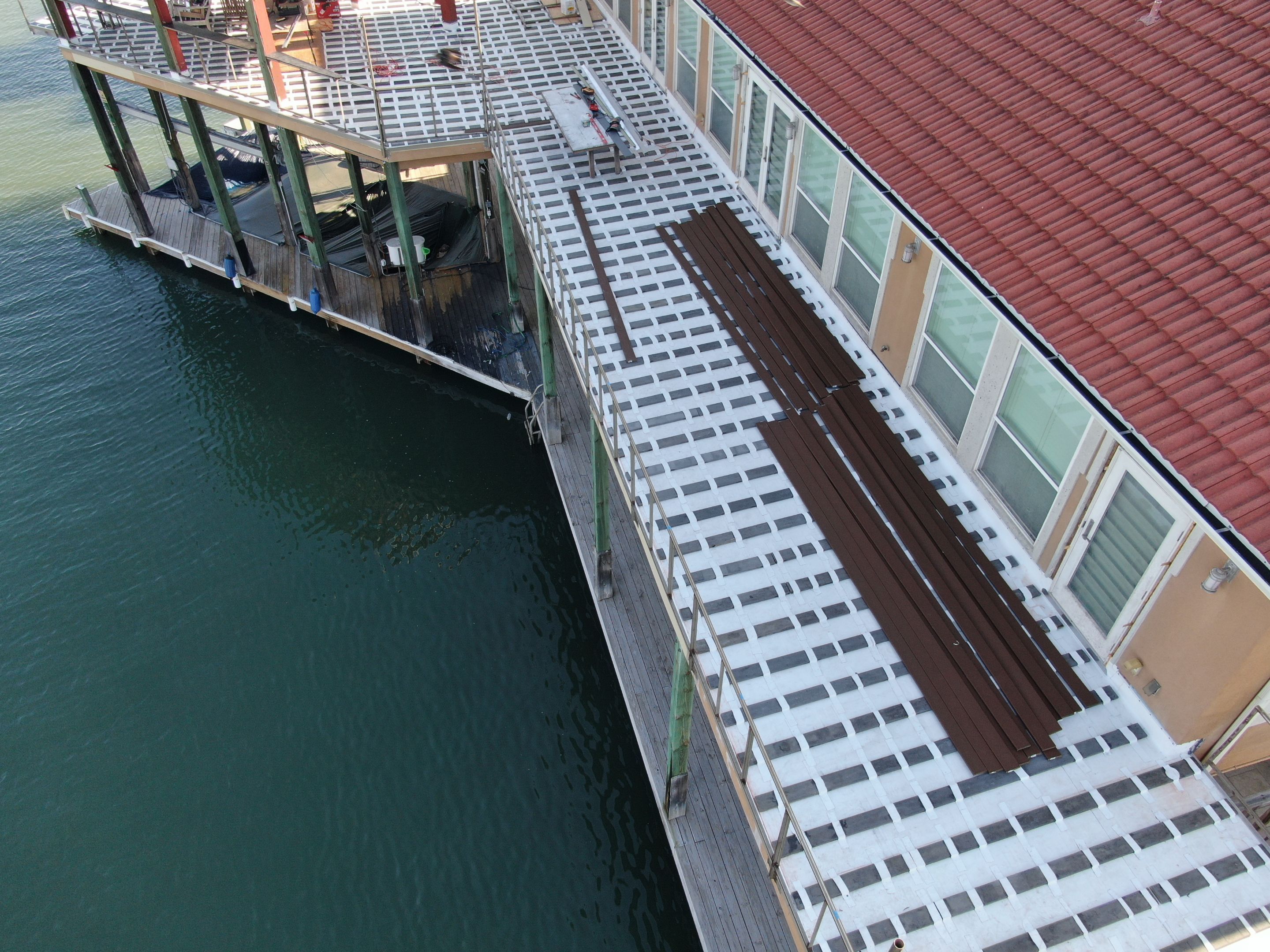Walk Out Patio Cover by Bayfront Roofing and Construction