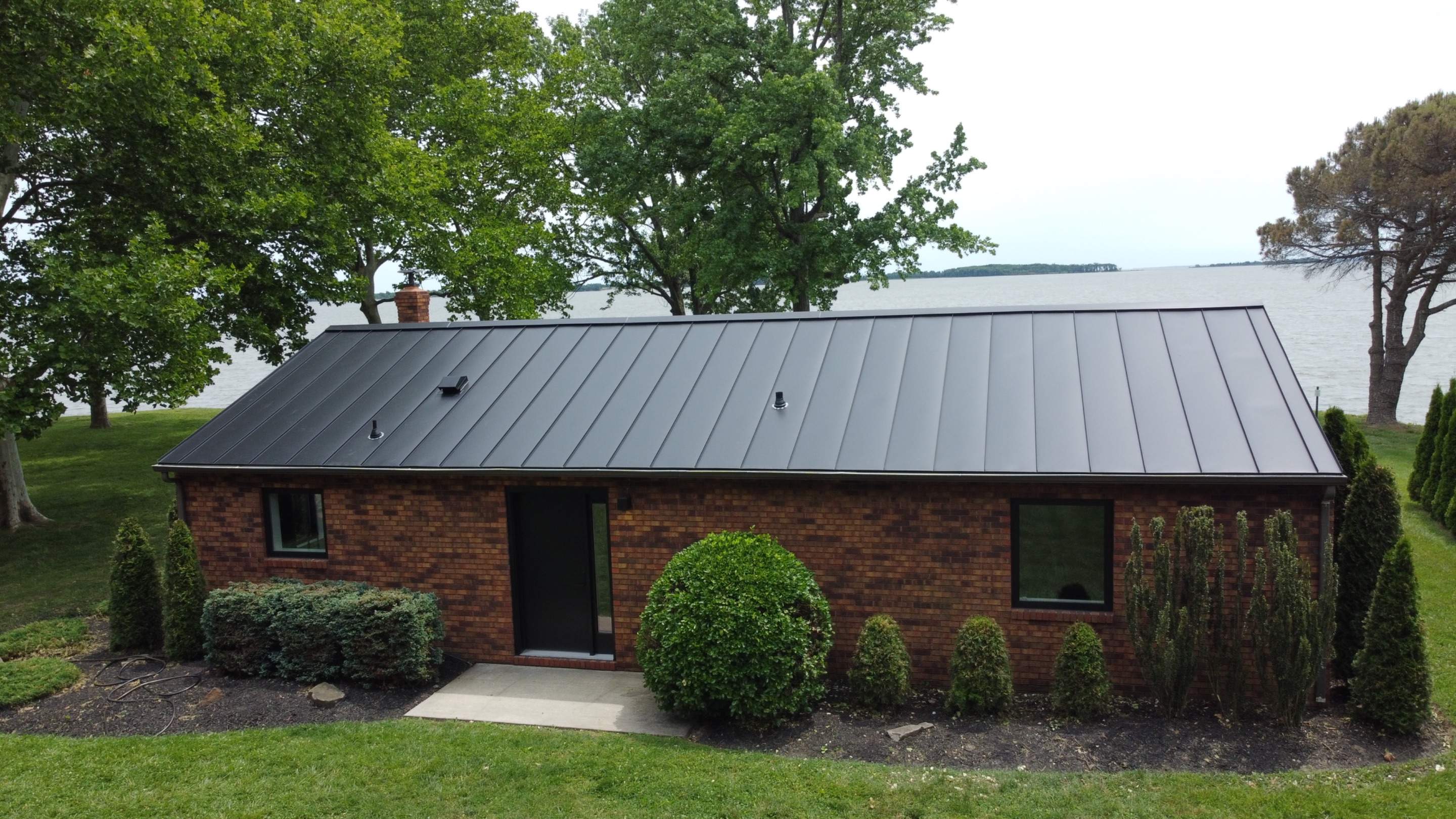 Residential Roofing Installation using Standing Seam Metal Roof | Mechanically Fastened | 24 Gauge by Matter Construction, LLC