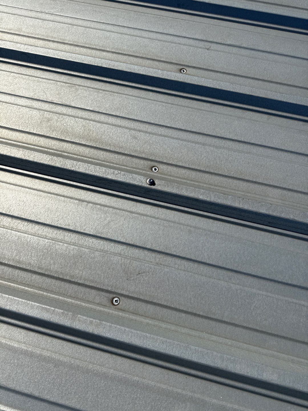Metal Roof Fastener Replacement and Seam Sealing in West Point, NE by Crows Roofing LLC