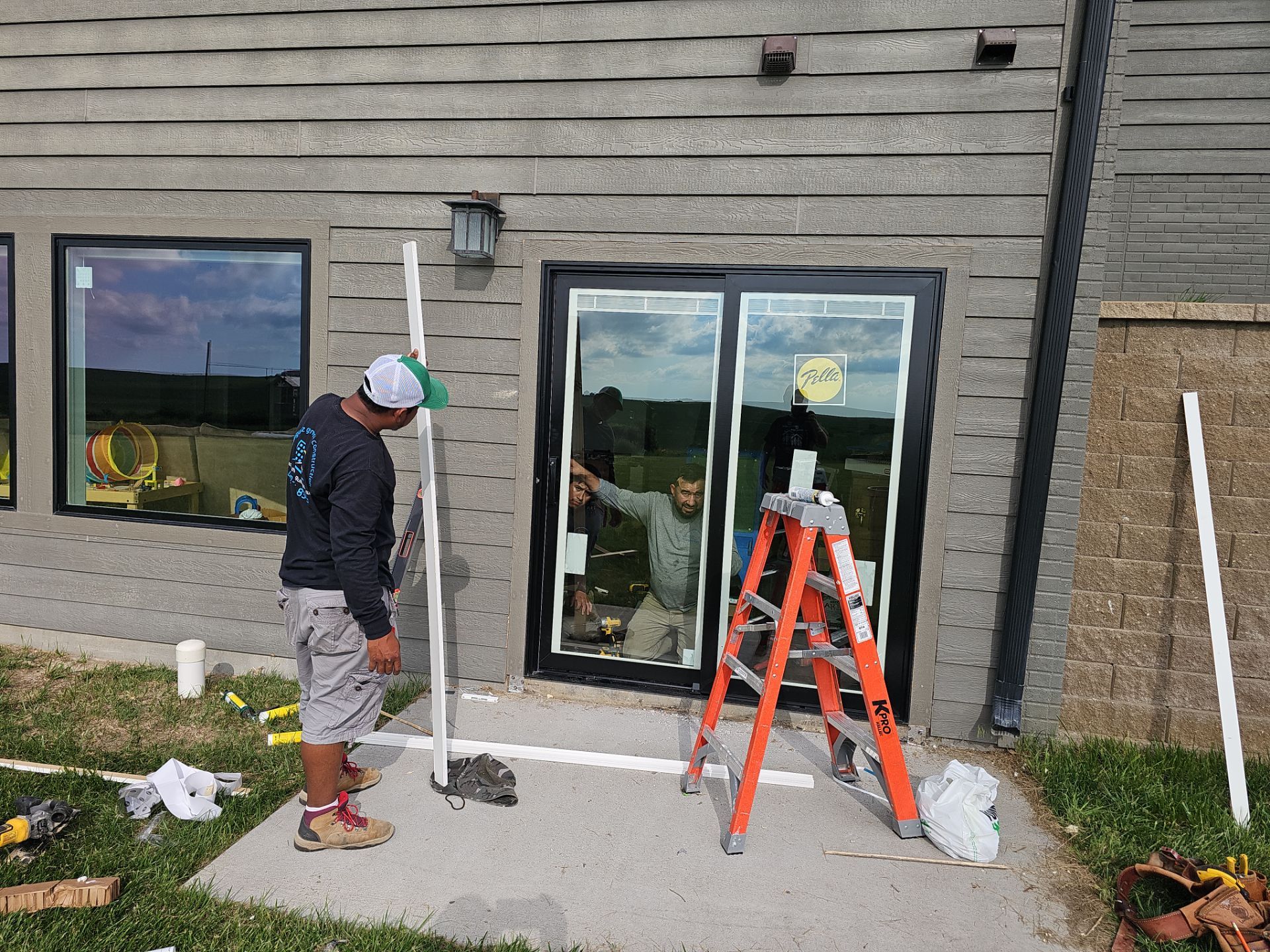 Pella Window and Seamless Gutter Installation in Ravenna by Loyal Nine
