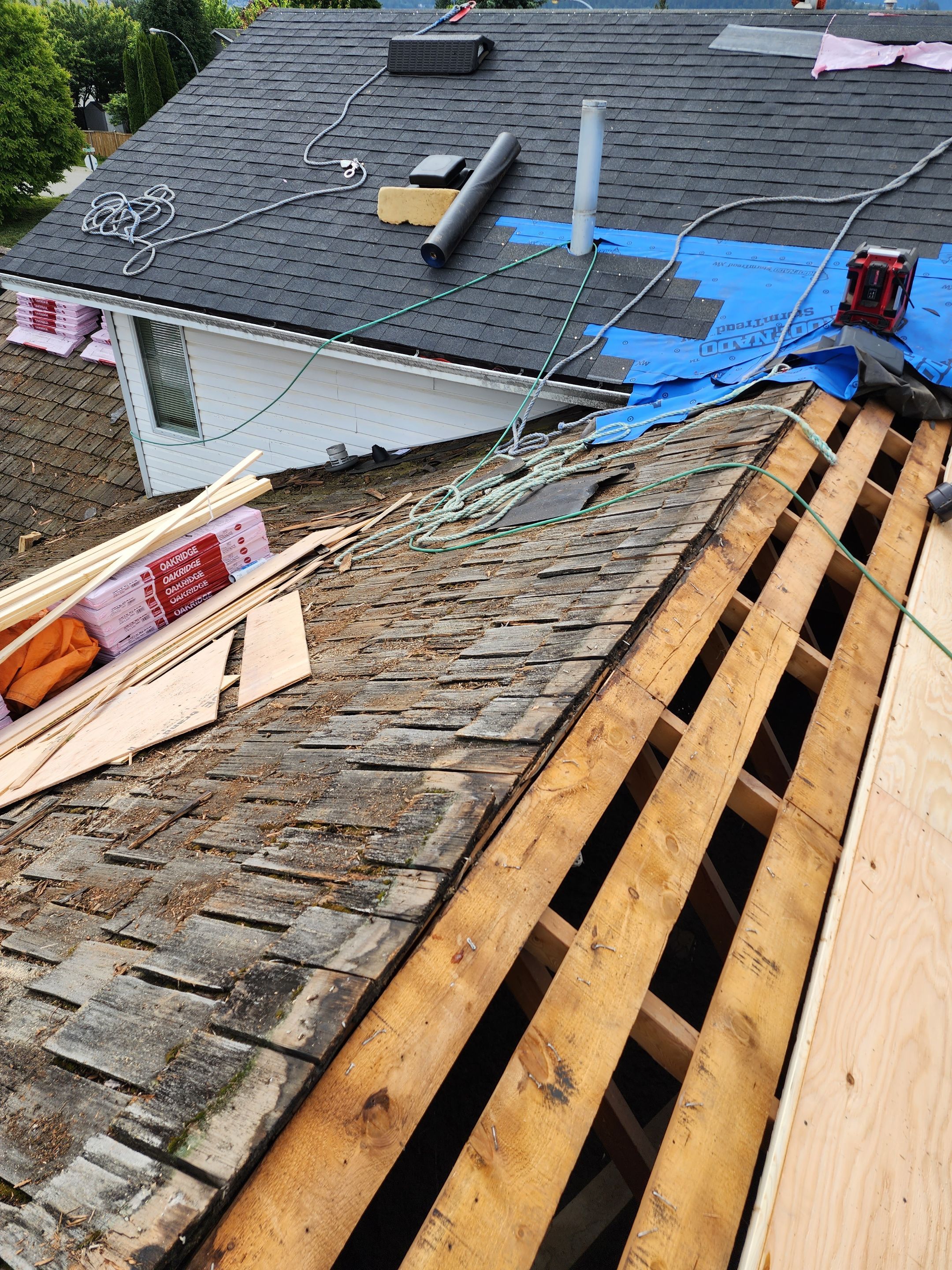 Residential Cedar ReRoofing Installation using OC Oakridge shingles by Top Notch Roofing Inc