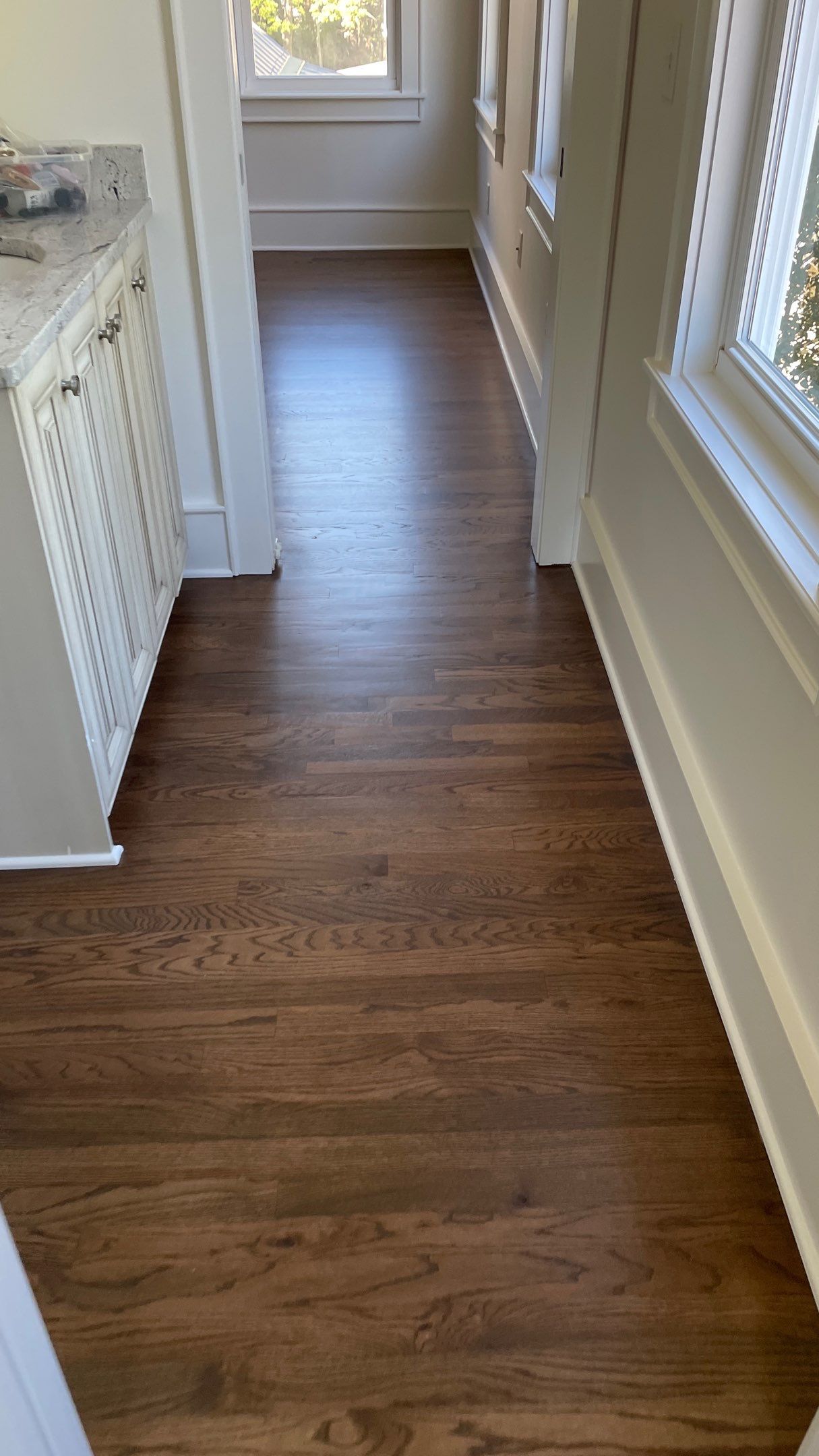 Herringbone Wood Hallway and Rooms by Footprints Floors of Coastal Carolina