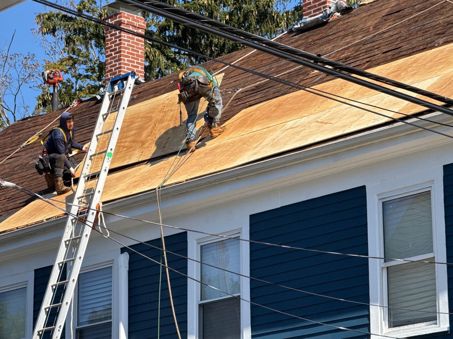 Half Roof Replacement for Solar Installation – Townhouse with New Plywood Decking by Sensible Home Solutions
