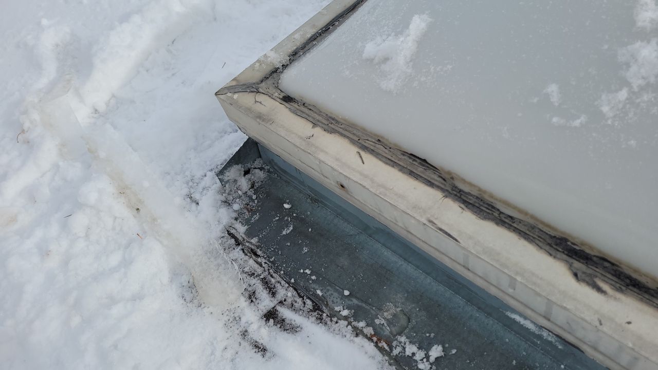 Skylight Removal using Shingle Repair by The Roof Doctor