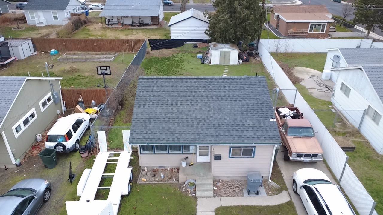 Residential Roofing Installation Featuring Granite Gray Shingles in Richland by Alpine Roofing