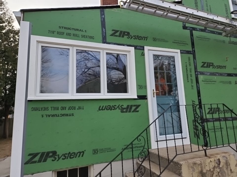James Hardie siding, new metal roof and couple windows being installed. by UBrothers Construction