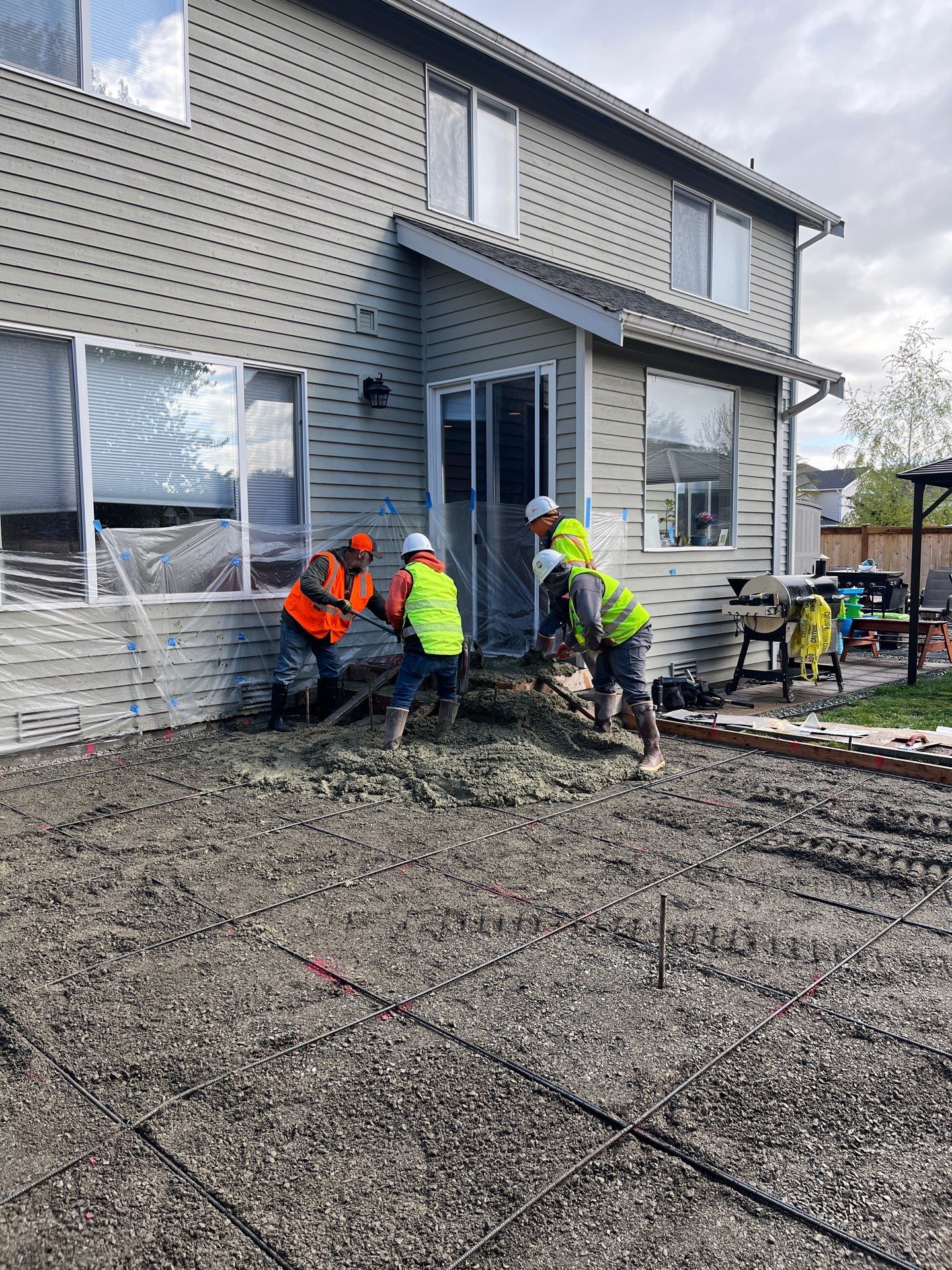Benedict | Stamped Concrete Back Patio by Jireh Asphalt & Concrete Inc 