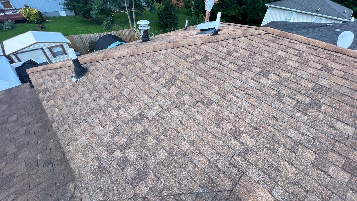 Residential Roofing Installation using 26 Gauge Metal by The Roofing Dudes