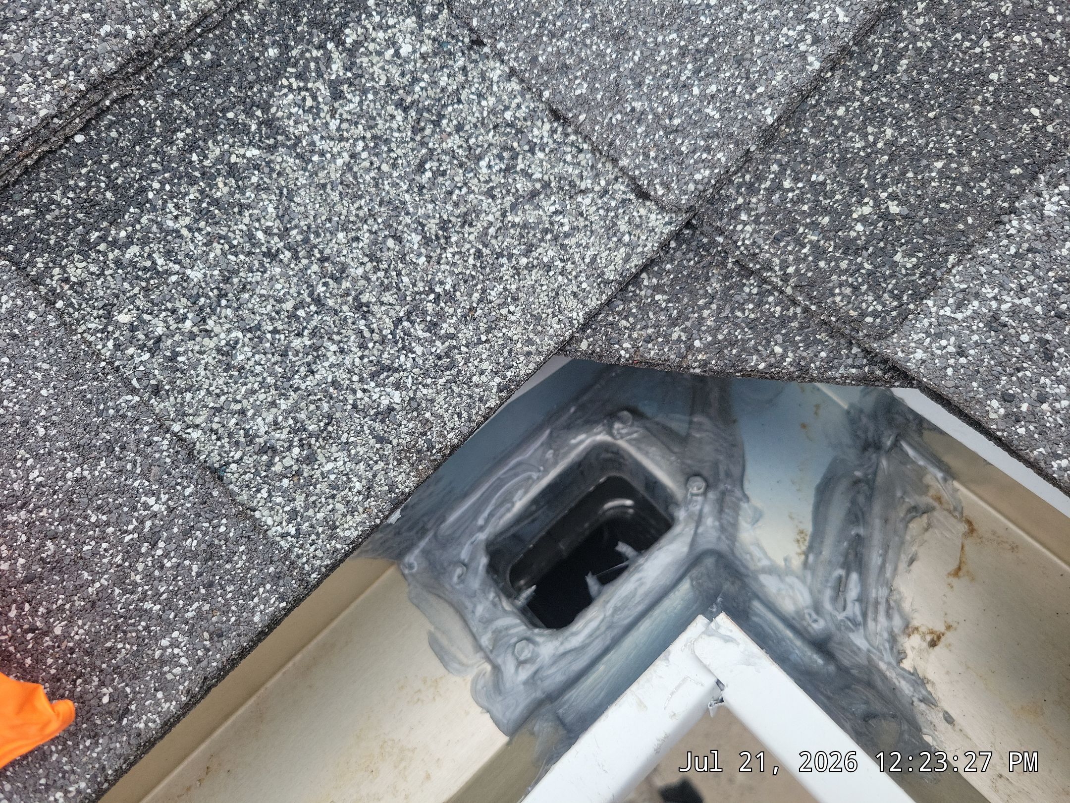 Seamless White Gutter and Downspout Installation in Albuquerque by Doyle Roof Masters Inc