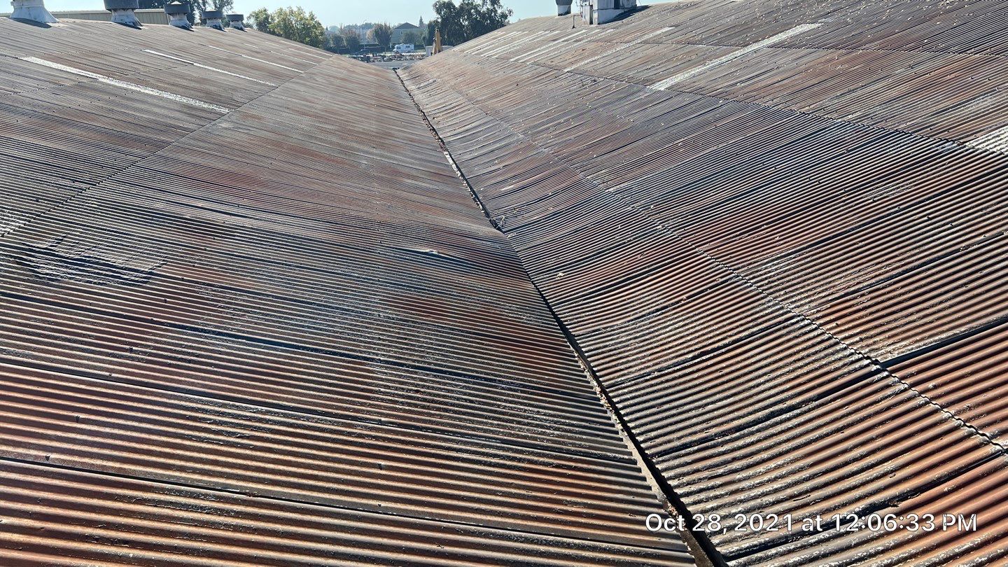 MR Roofing system using Conklin BenchPly system with PUMA top coat by Straight Edge Roofing Inc