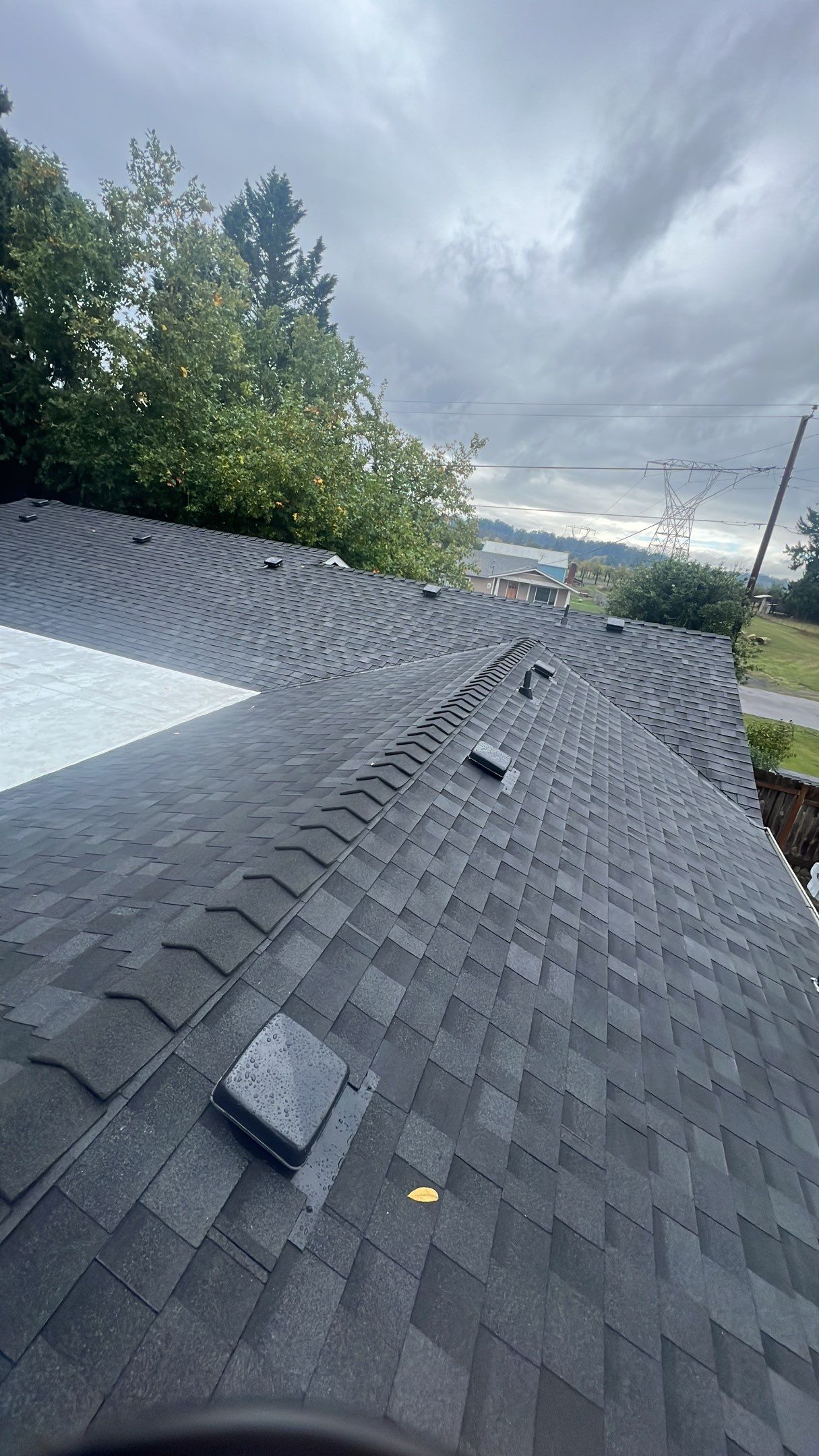 Residential Roofing Installation using IKO Dynasty (Color: Granite Black) by Orezona Building & Roofing Company, Inc.