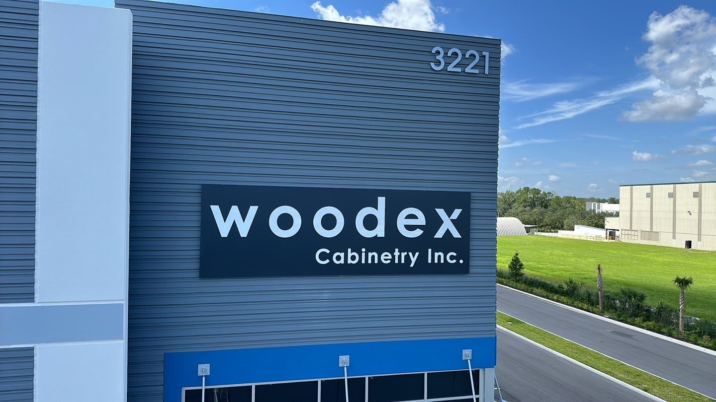 Acrylic Letters on Aluminum Backer for Woodex Cabinetry by SignCrafters