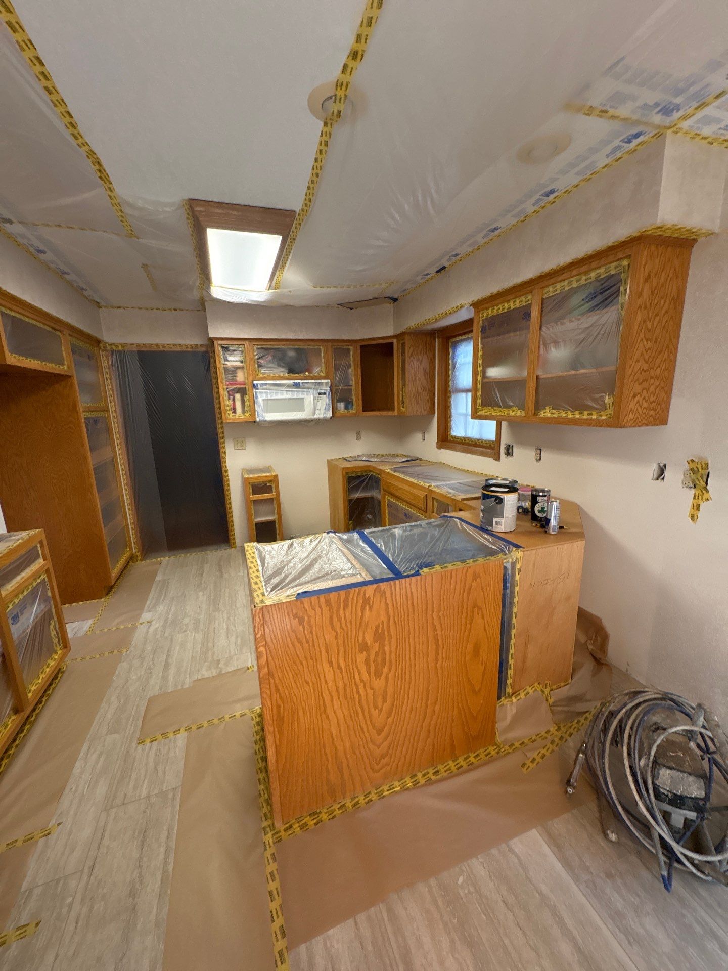 Kitchen Cabinet Painting and Hardware Update in Sioux Falls by Select Painting, Coatings & Garage Cabinets