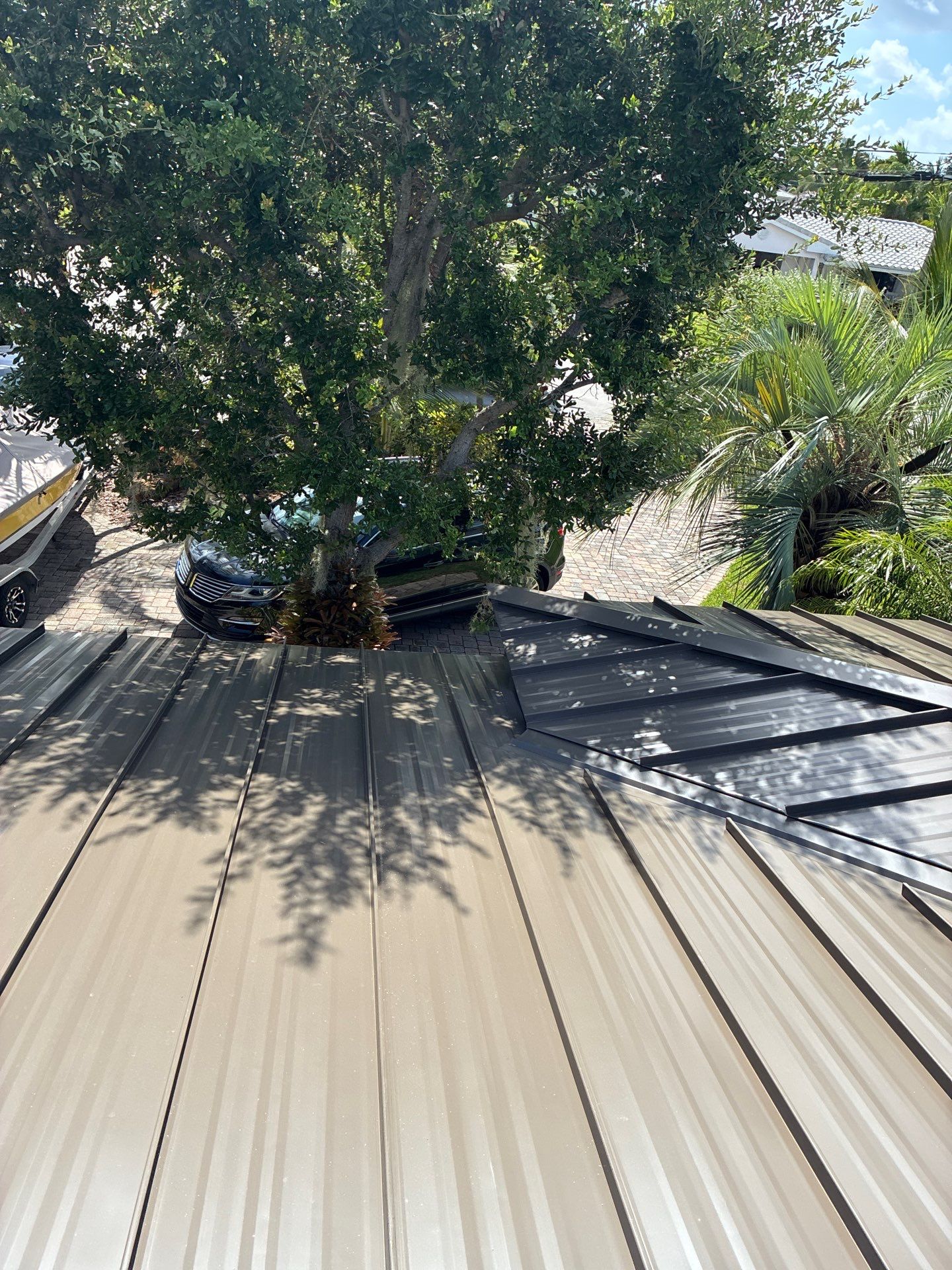 .032 Aluminum 1.5" Mechanical Seam Medium Bronze by Total Roofing System The Metal Roof Experts