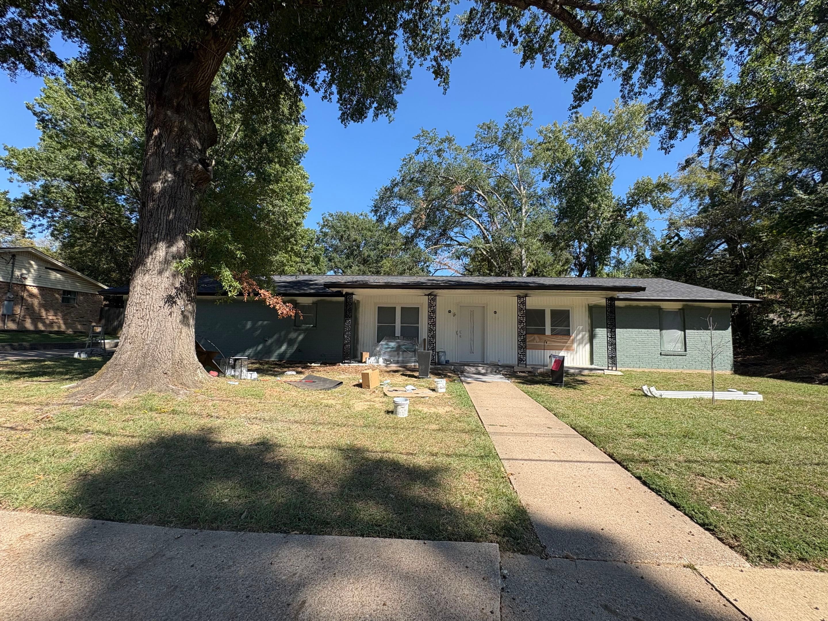 From Basic Brick to Bold Sage Green in Tyler, TX! Quality Coats Painting by Quality Coats Painting