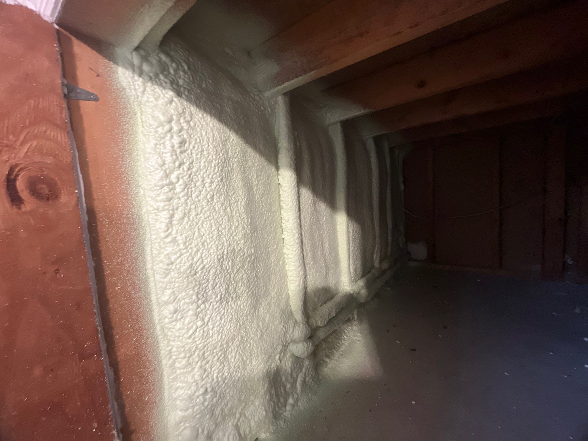 Garage ceiling using open cell spray foam by NYS Foam & Energy