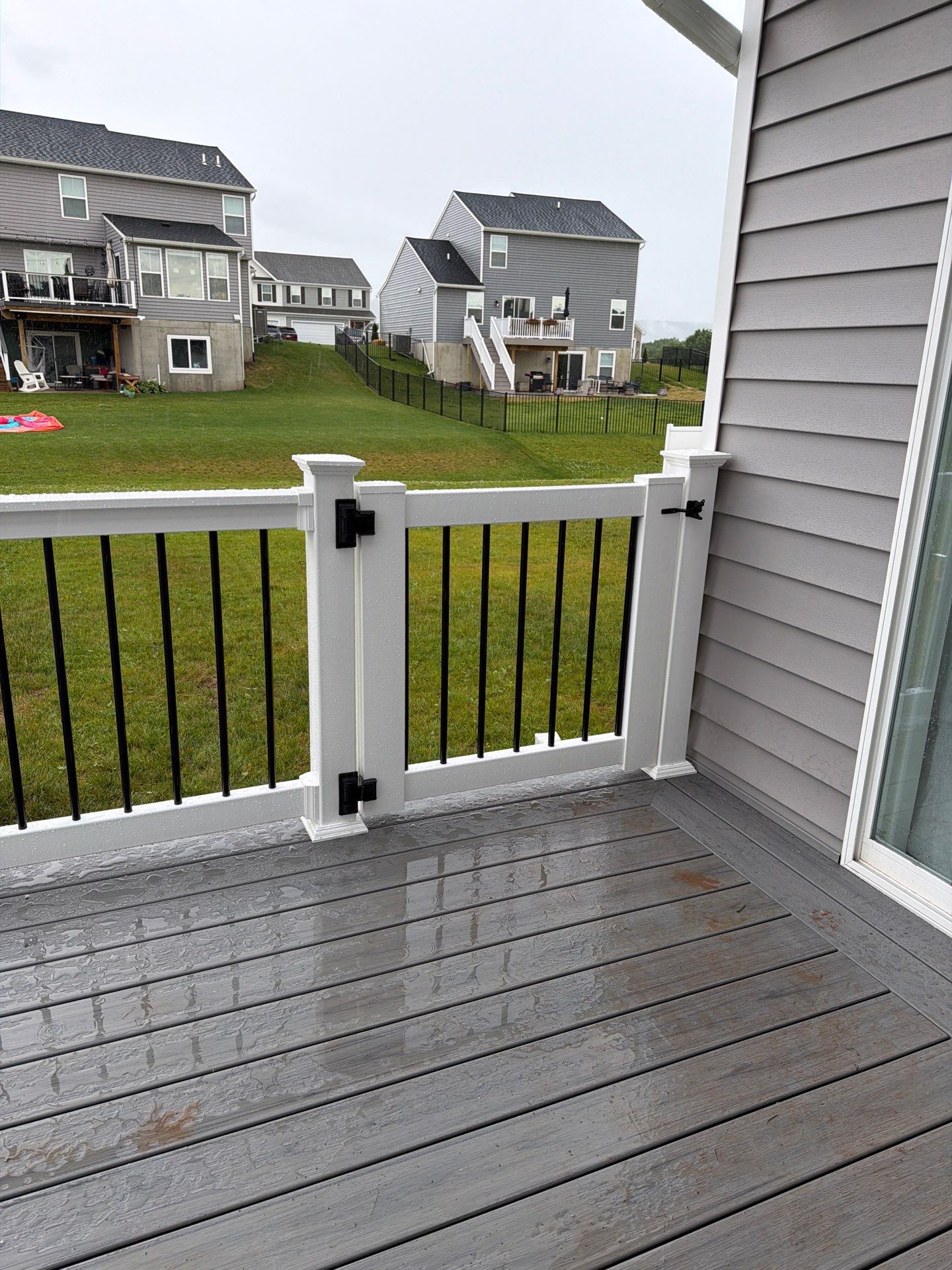 Custom Gray Composite Deck Installation in Duncannon by Esh Builders