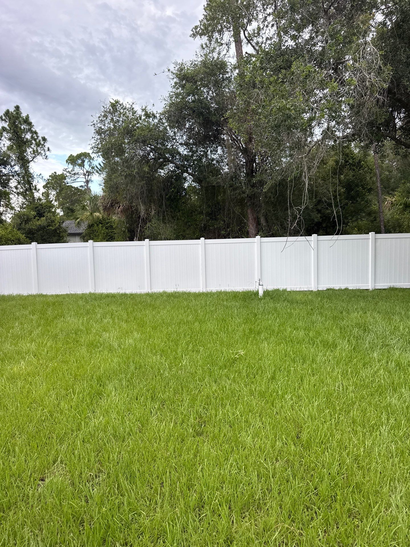 White Vinyl Privacy Fence Installation in North Port by True Fence LLC