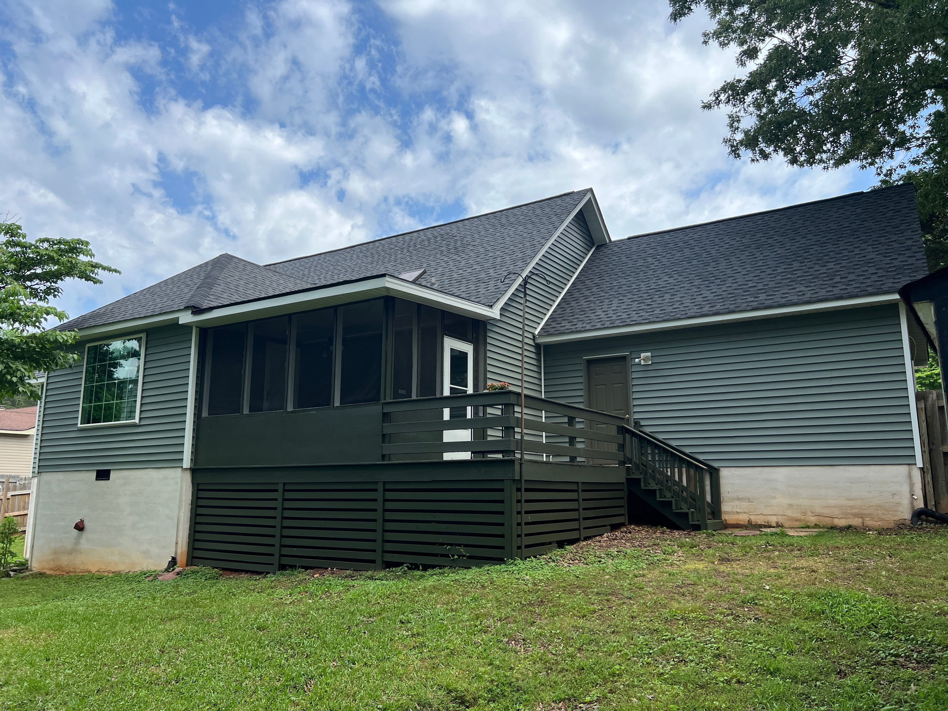 Siding Replacement using Mastic Carvedwood Vinyl Plank by Freedom Exteriors