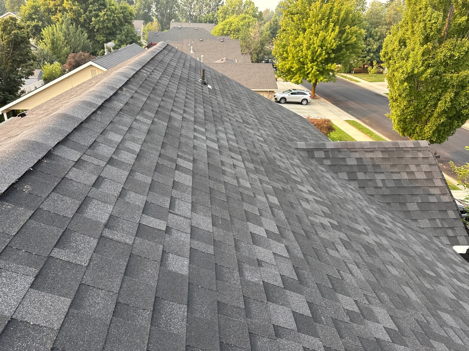 Meridian Residential Roof Replacement Using Dark Gray Architectural Shingles by Olive Roofing