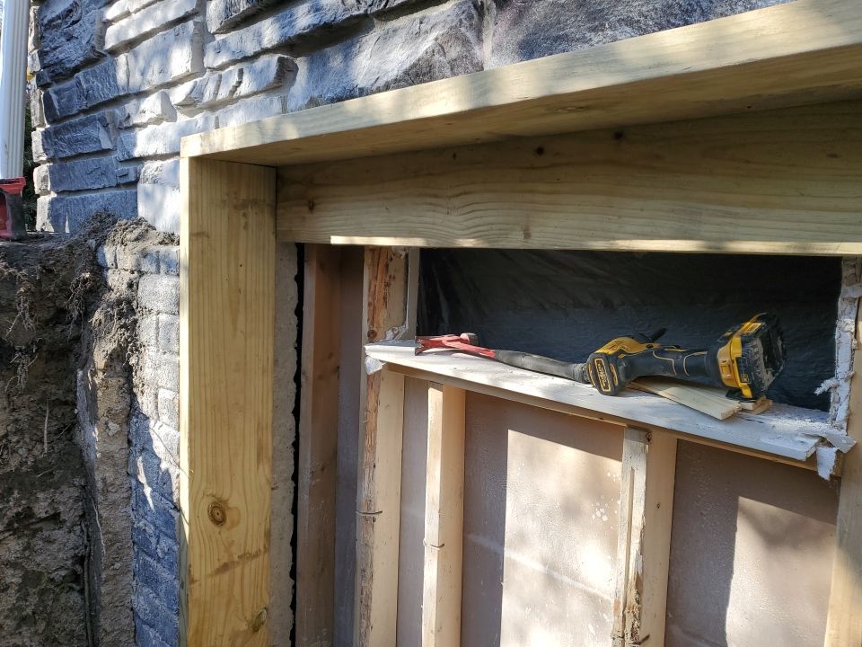 Egress Window Installation using Rockwell Egress Fiberglass Egress Window Well by Toledo Basement Repair 