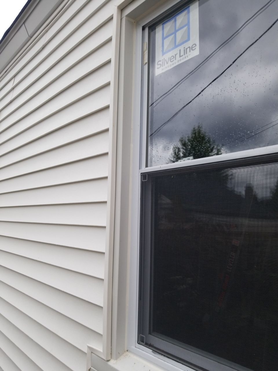 Residential Roofing Installation, Dec-tek walk-out porch roof, siding on garage by Absolute Roofing and Construction