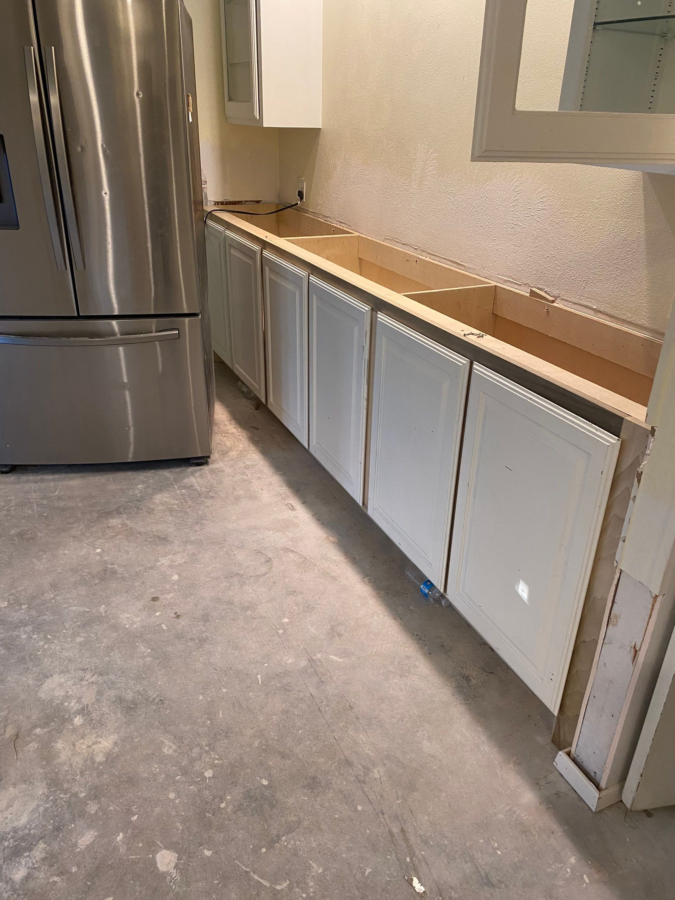Home Remodel after Huge Water Damage by L&T General Contractors and Restoration INC