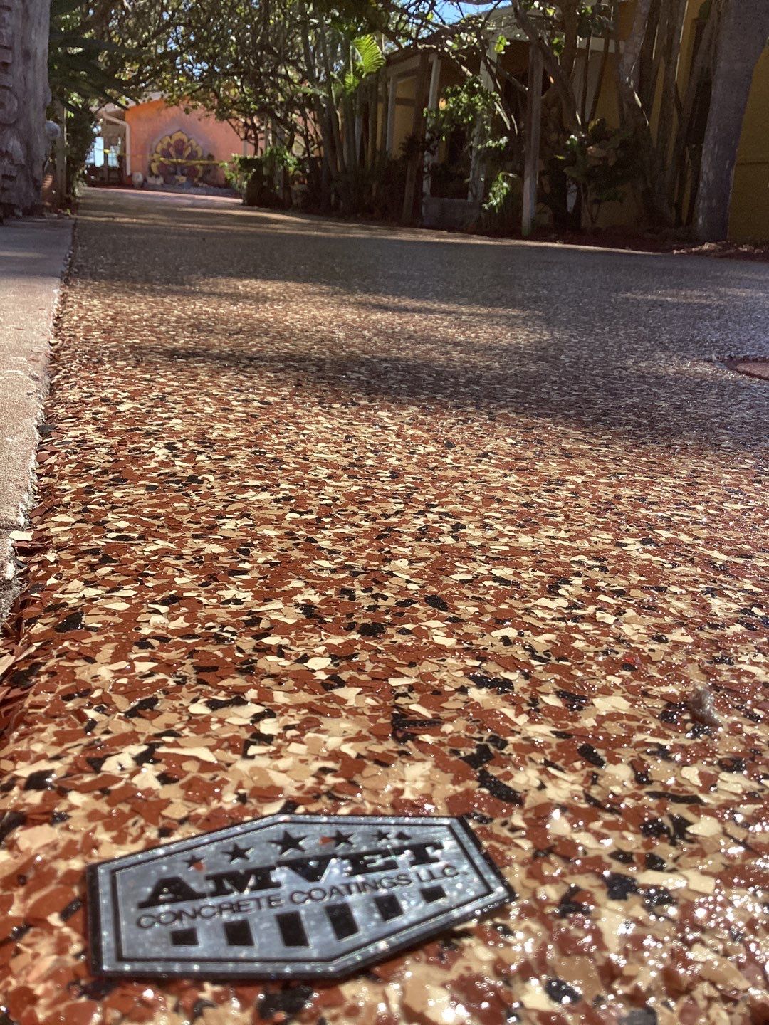 Sidewalks and Porches using Chestnut by Amvet concrete coatings llc