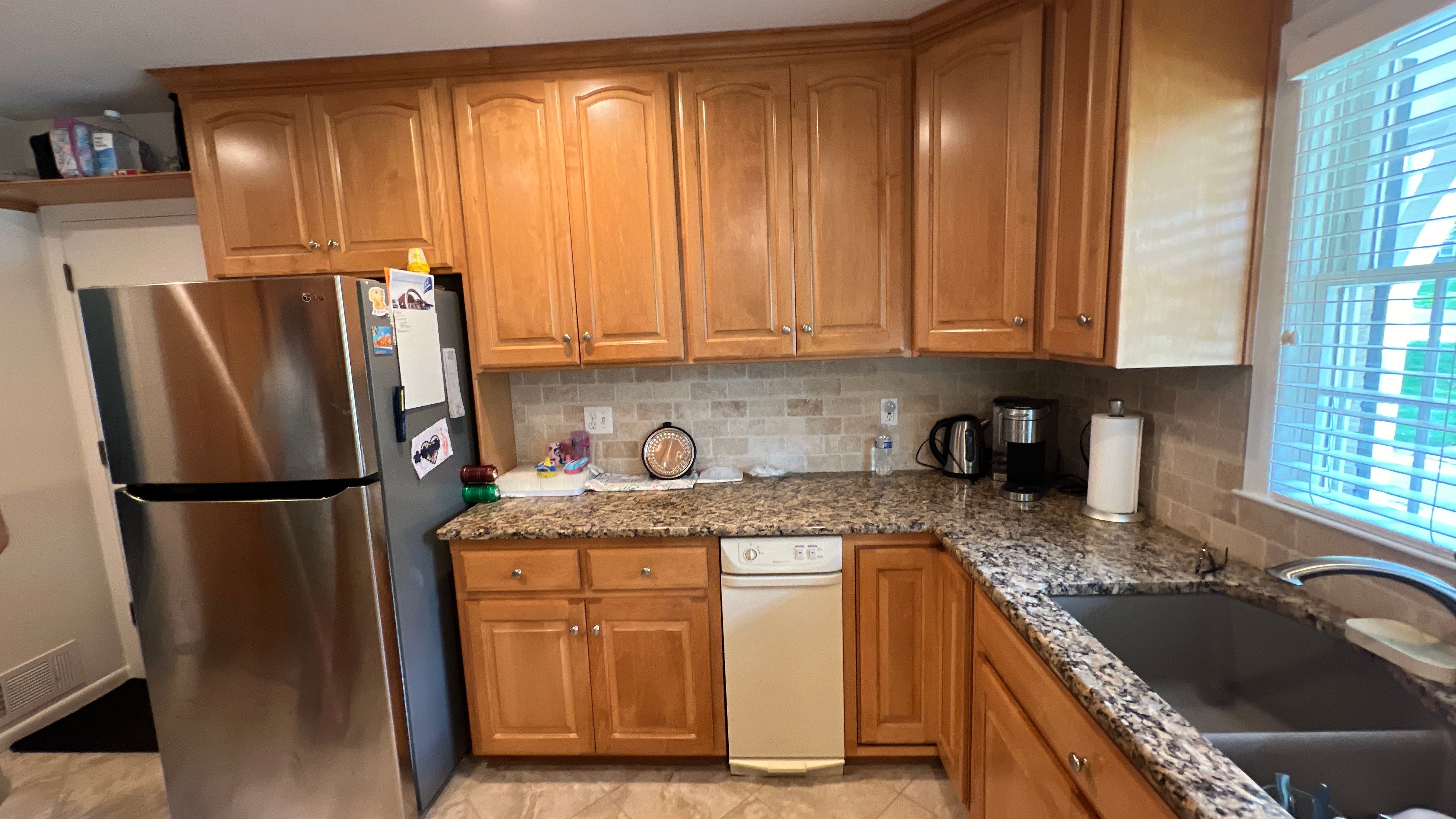 Elegant Transformation: Stained Cabinets Revamped with Sherwin-Williams Juniper by Cougar Painting