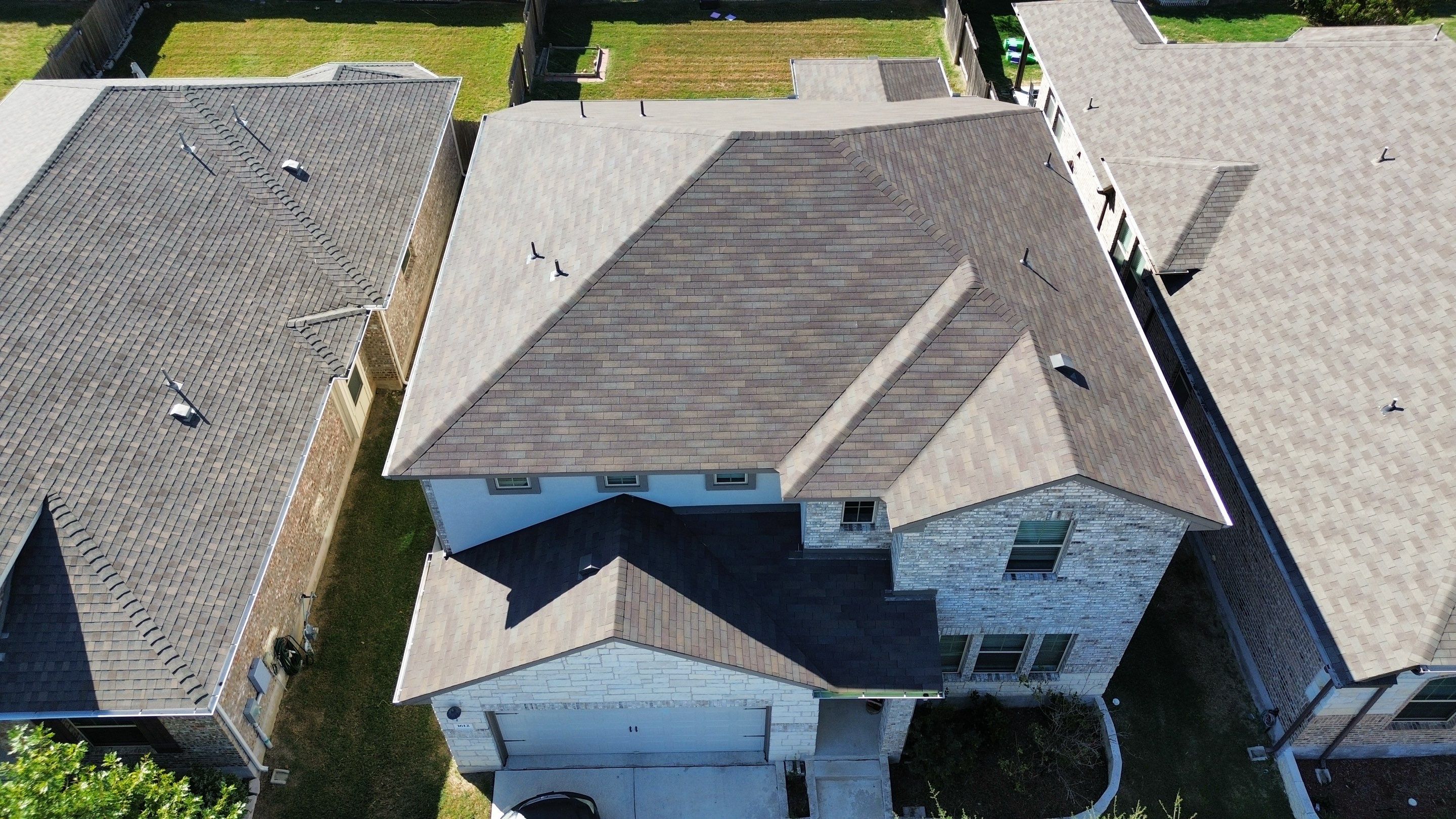 Residential Roof Installation ā Supreme Teak Shingles | Leander, TX by Kstylez Roofing & Construction
