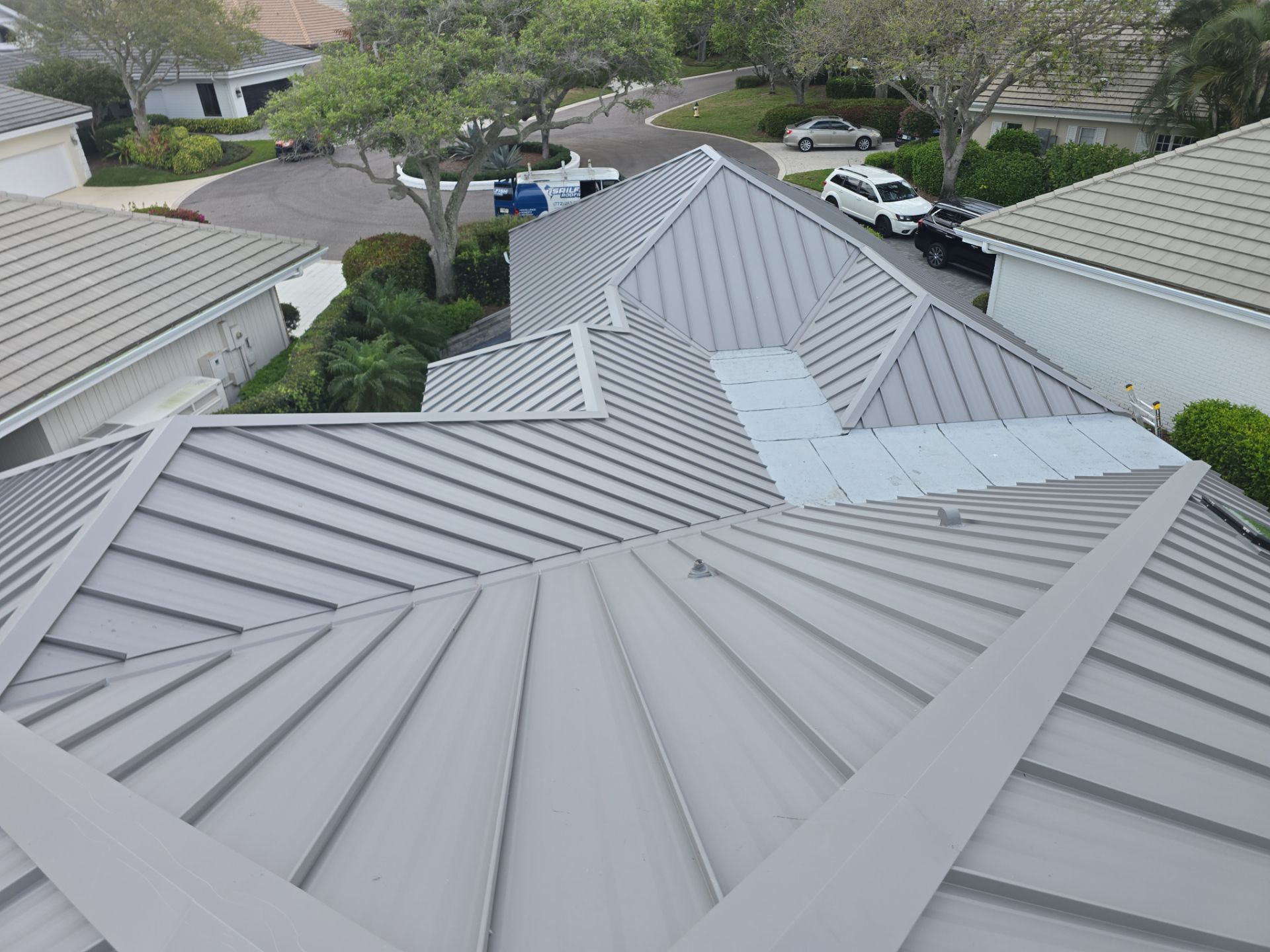 Kynar (Color Coated) 1.5" Standing Seam Metal Roof Installation by Sailfish Roofing