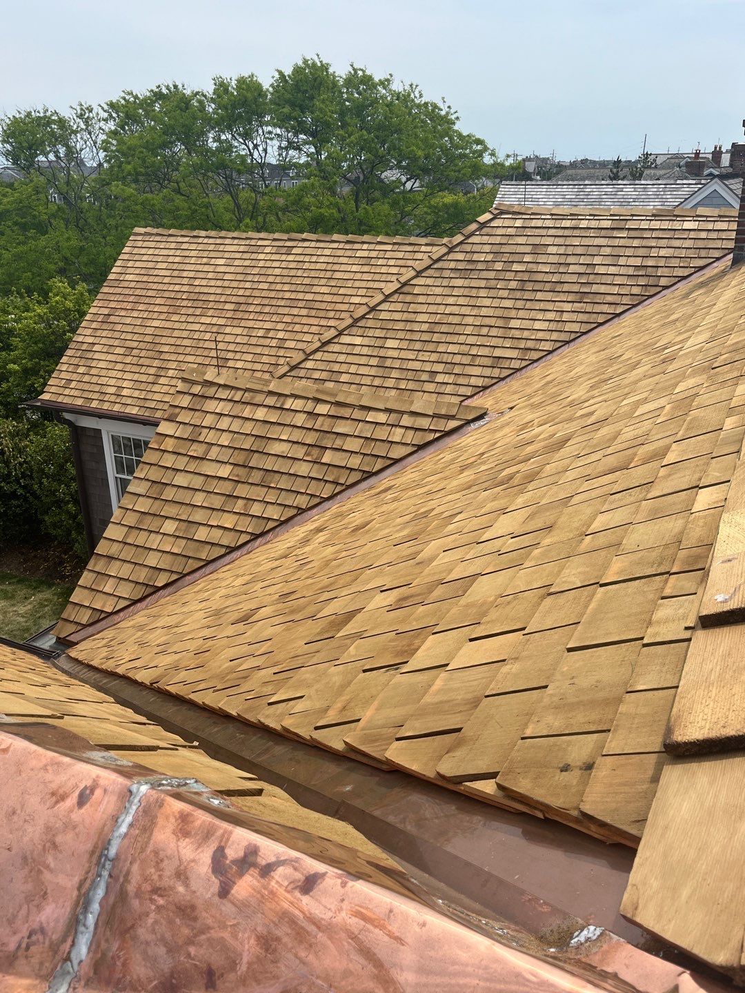 Residential Roofing Installation using Cedar Shakes by CMNG LLC