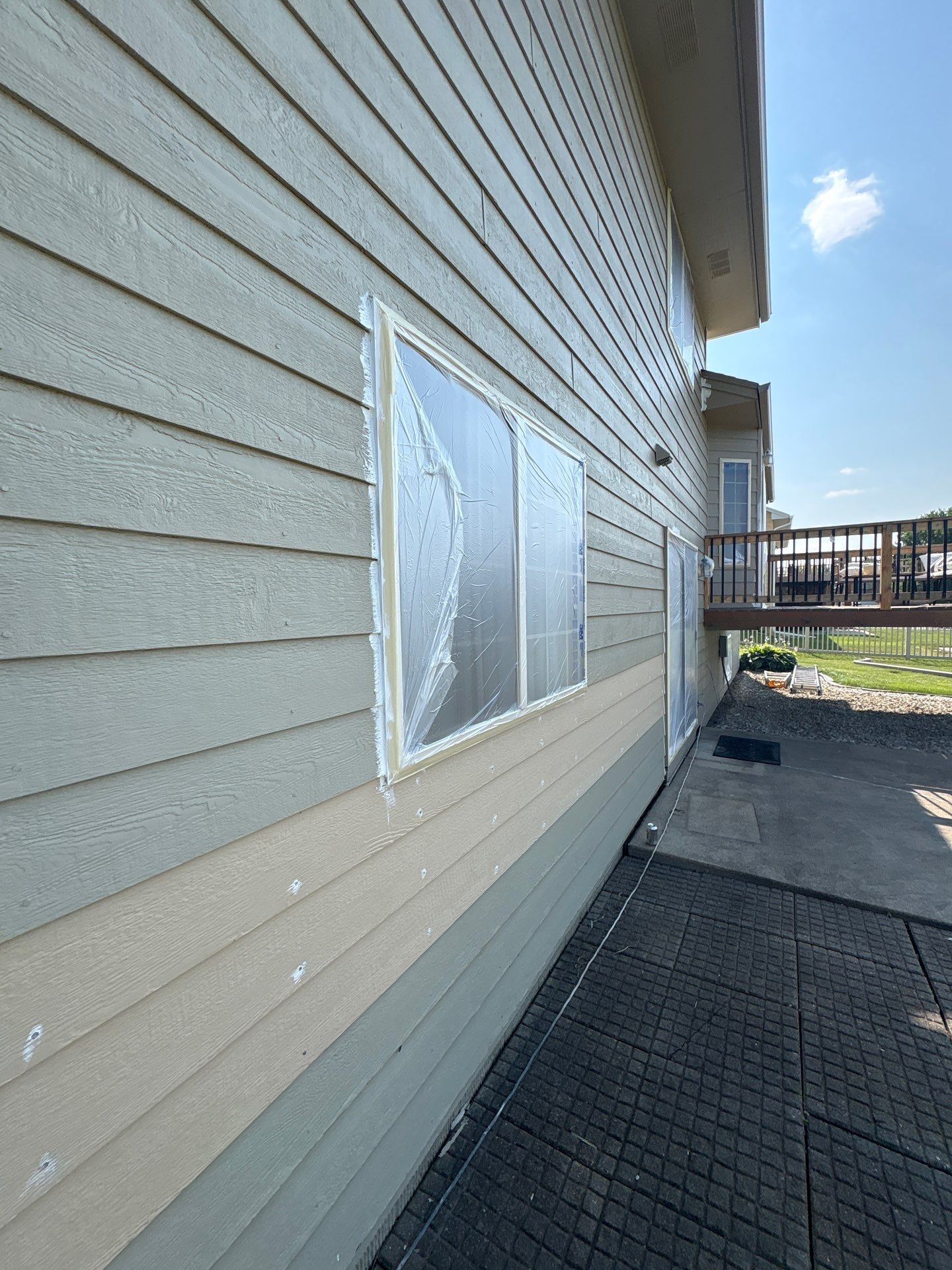 Residential Exterior Painting and Siding Refresh in Sioux Falls by Select Painting, Coatings & Garage Cabinets