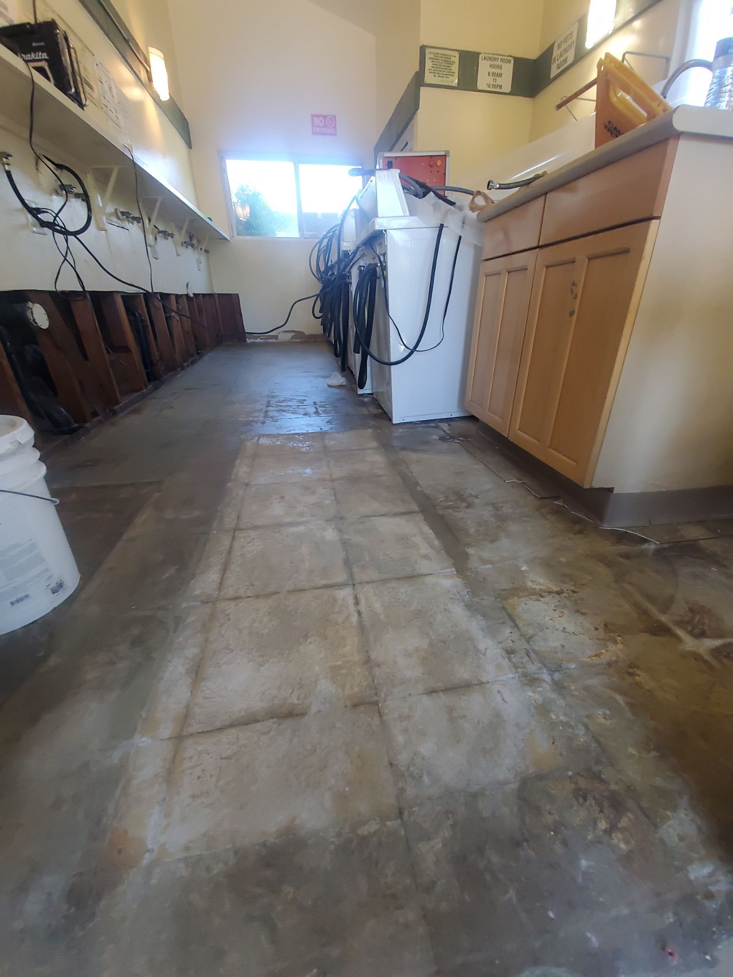 Laundry Room Water Restoration & Rebuild in Irvine by One Stop Source
