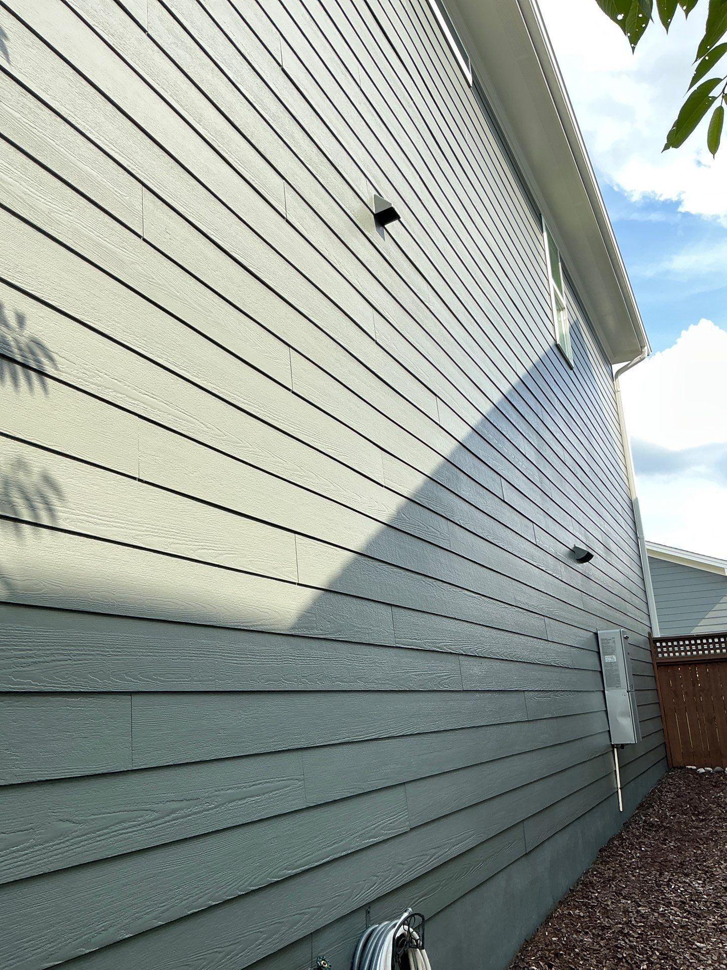 Siding replacement and exterior painting by GonzalezPainters & Contractors Inc