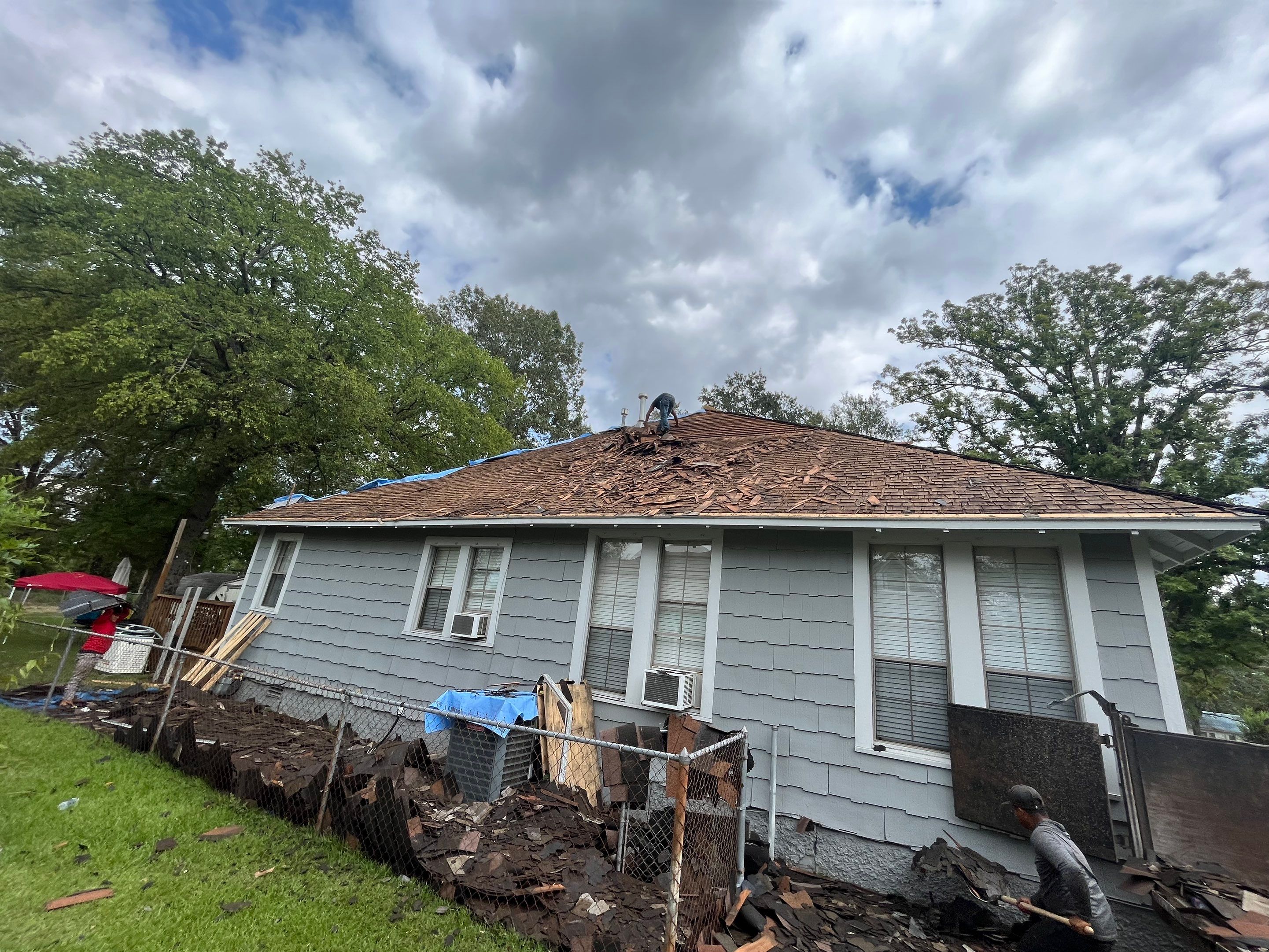 Residential Metal Roof Replacement using Reed's Metals: Colored Residental Panel (Burgundy) by Hostetler Roofing