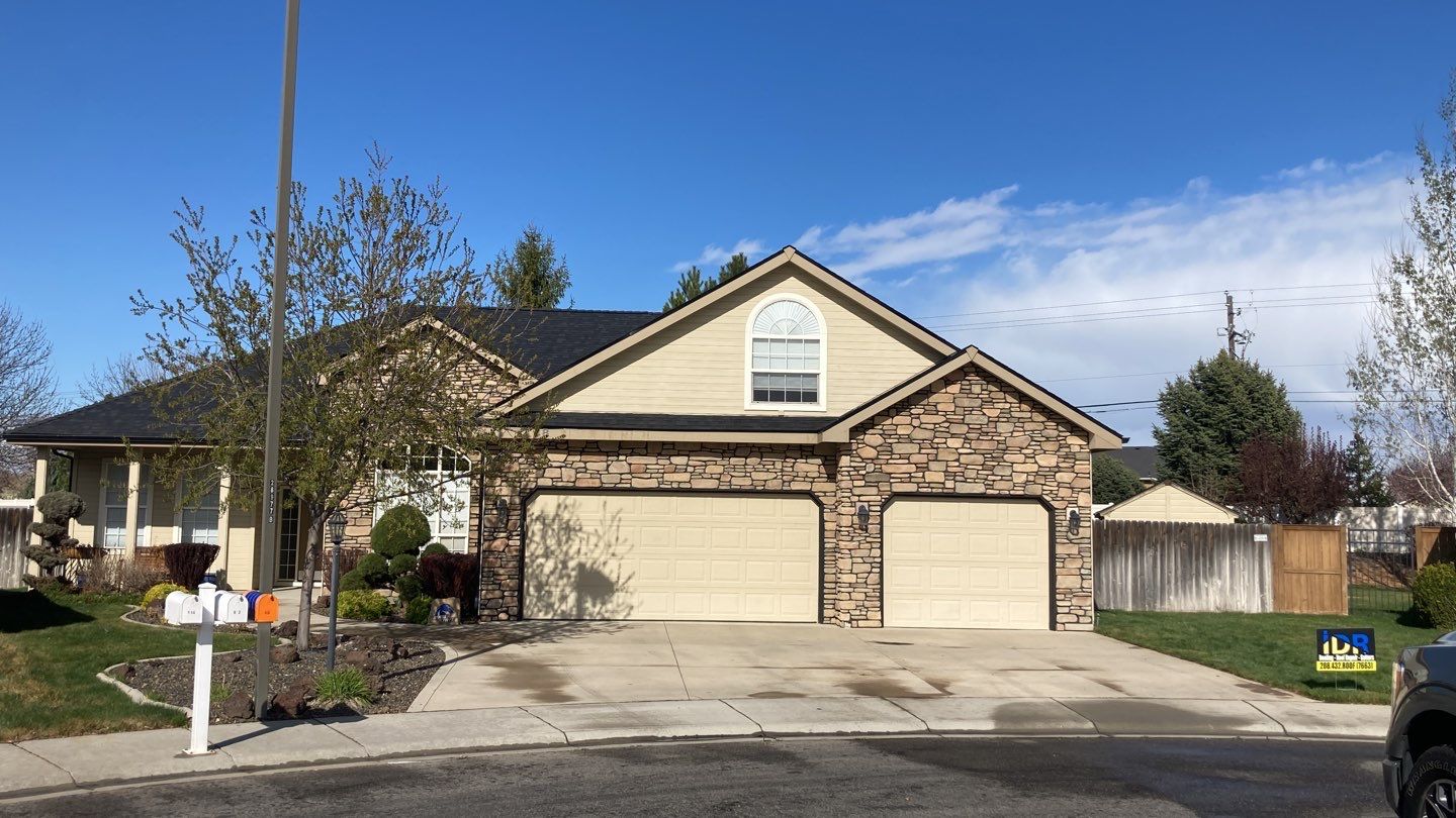 Beautifully maintained two story home with Duration Onyx Black located in Meridian by ID Roofing LLC