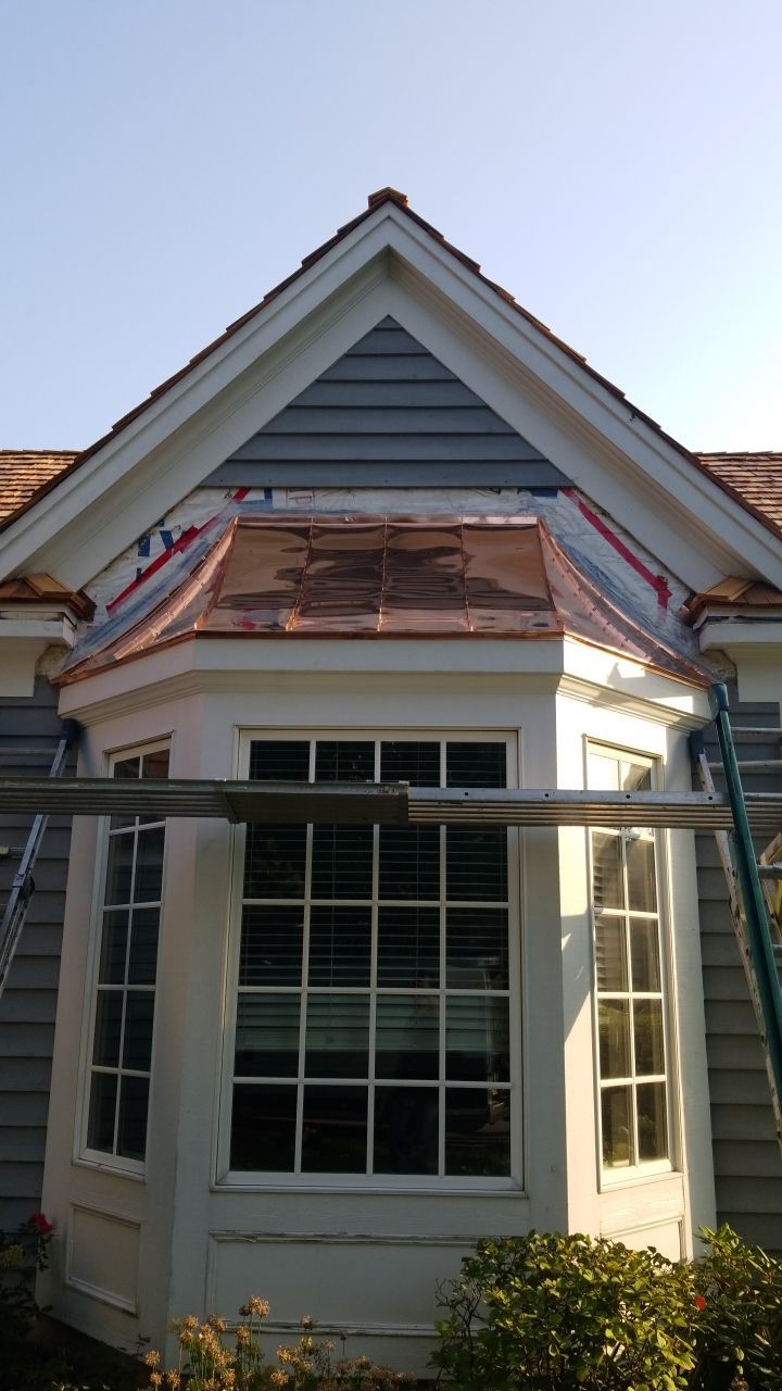 Cedar Roof Installation in Lake Forest by Custom Installations, Inc.