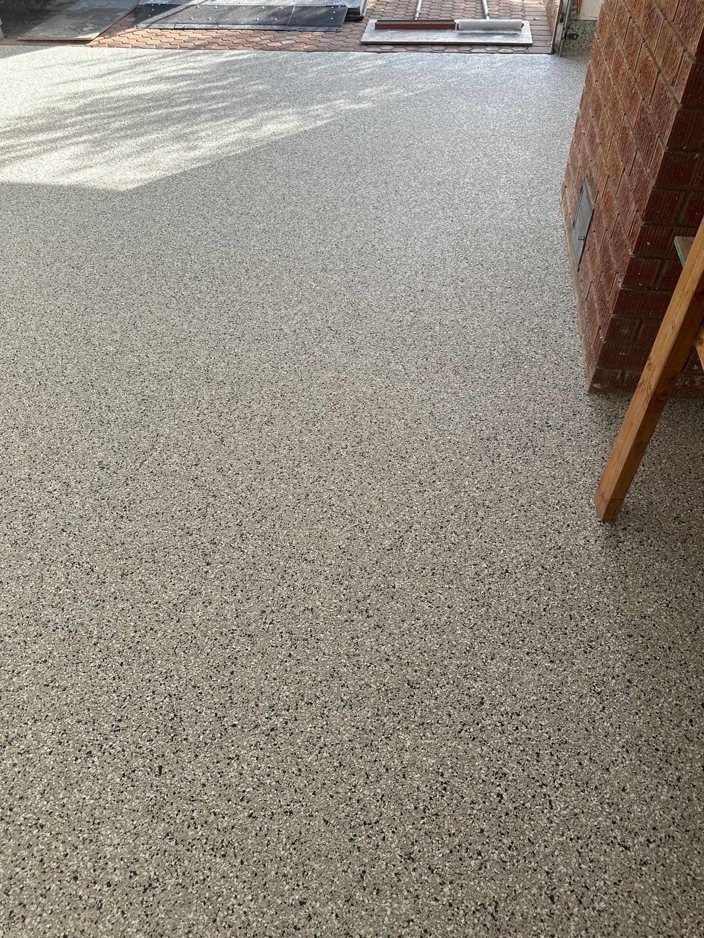 Polyurea Garage Floor Coating with Cabin Fever Decorative Chips in Cambria by MGP Coatings