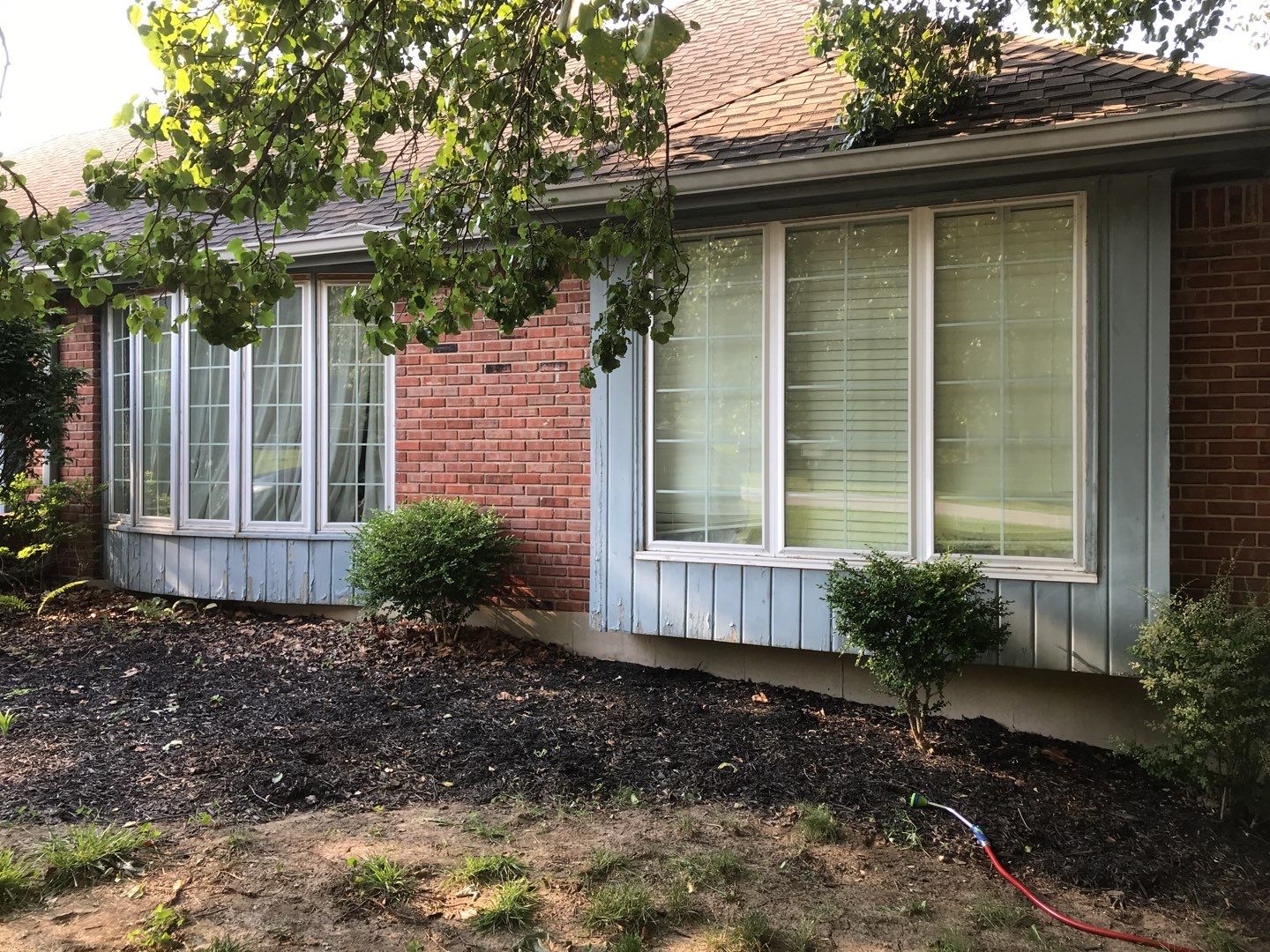 New white siding with Black trim by EEC  Windows, Siding & Roofing 