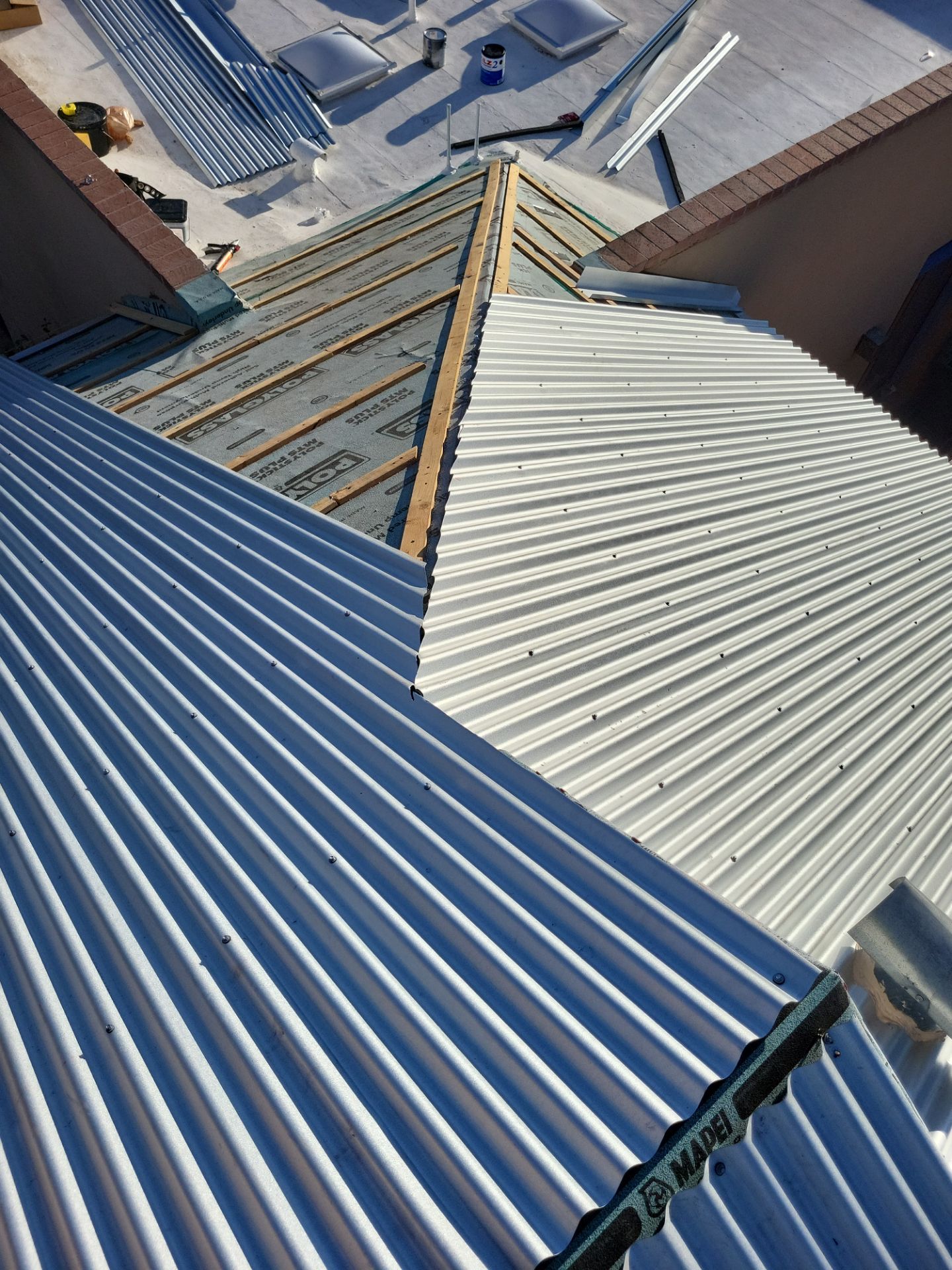 Metallic Silver Exposed Fastener by Reimagine Roofing