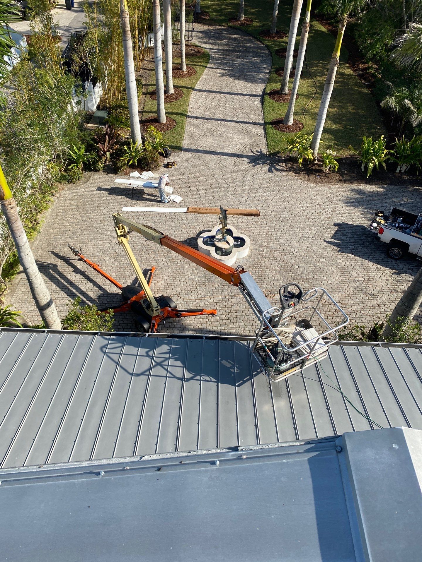 Seamless Gutter Installation for Beach Homes in Sarasota FL by Gutter Professors