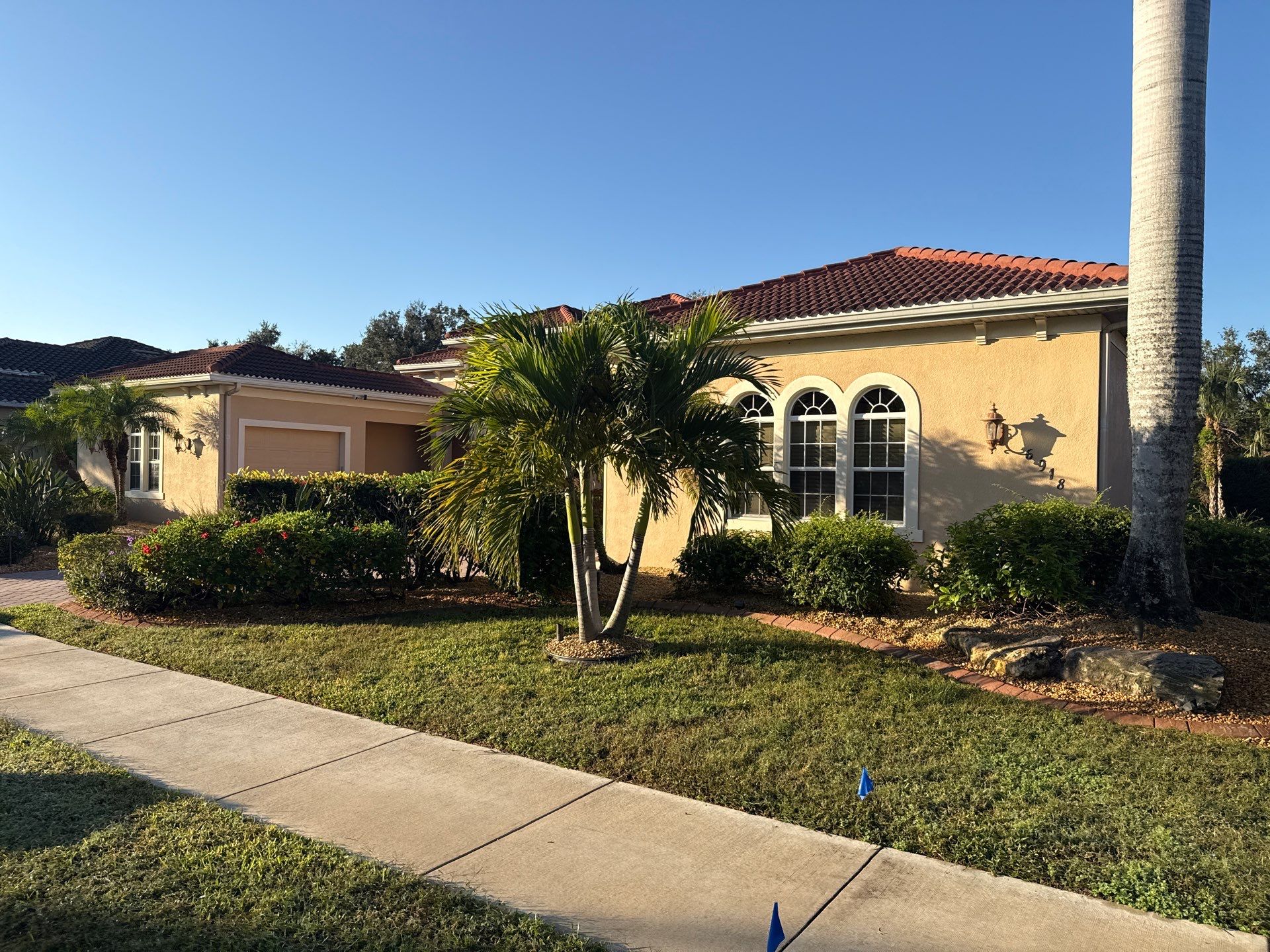 Tile Roof Cleaning & Oil Stain Removal | Tara River Place, Bradenton FL by Sunshine AquaWash