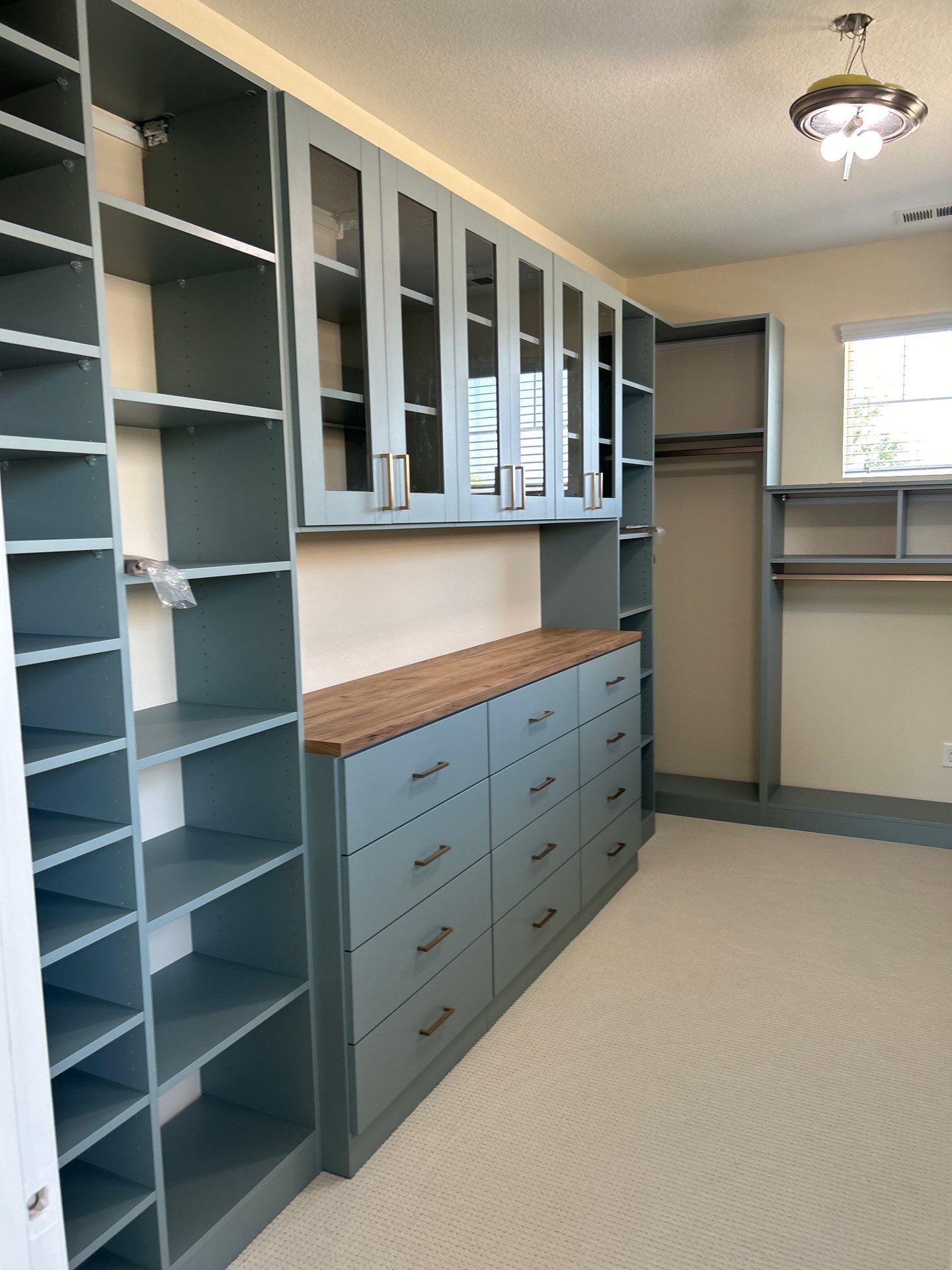 Multiple Closet Installations in Longmont by Concept 32, Inc.