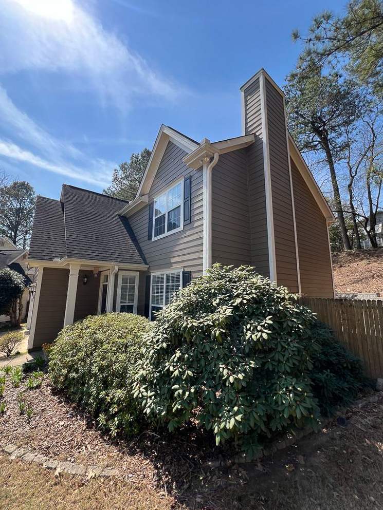 Green Exterior Paint and James Hardie Siding Transformation in Smyrna, GA by Nelson Exteriors 