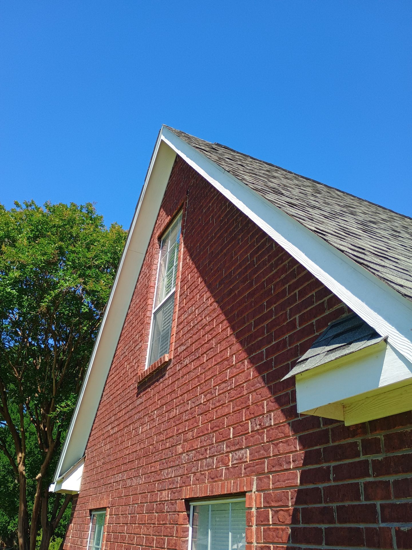 Architectural Shingle Roof Replacement for Brick Residence in Ardmore by BANA Roofing and Solar Supply