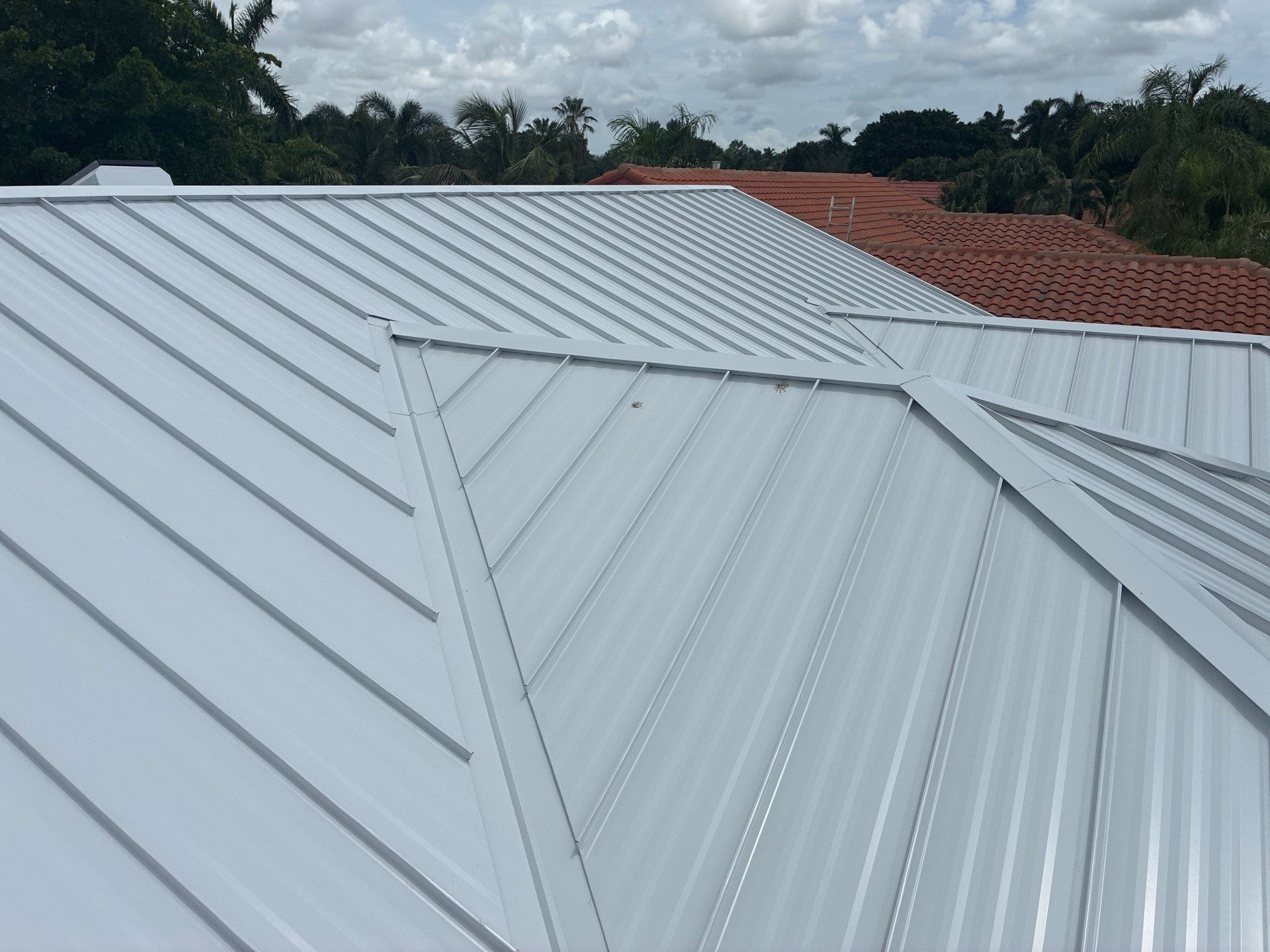 24ga 1.5" Mechanical Seam Regal White  by Total Roofing System The Metal Roof Experts