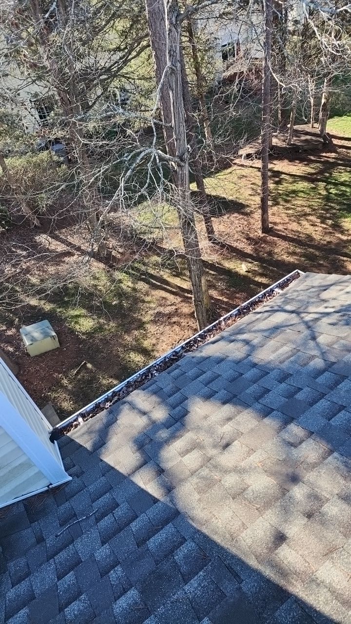 Gutter Cleaning using water by Power Wash Masters LLC